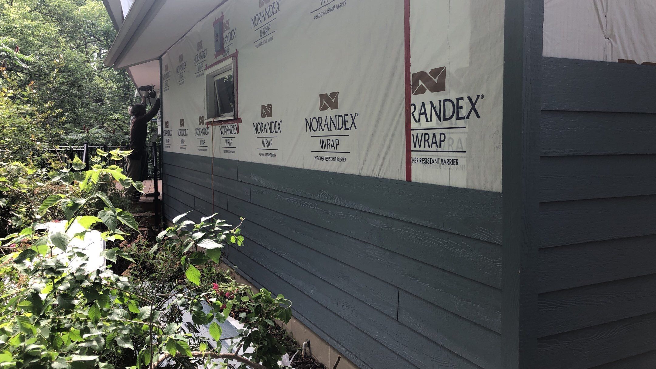Siding Installation using LP SmartSide and Pella Vinyl Windows by MODERN EXTERIOR SYSTEMS