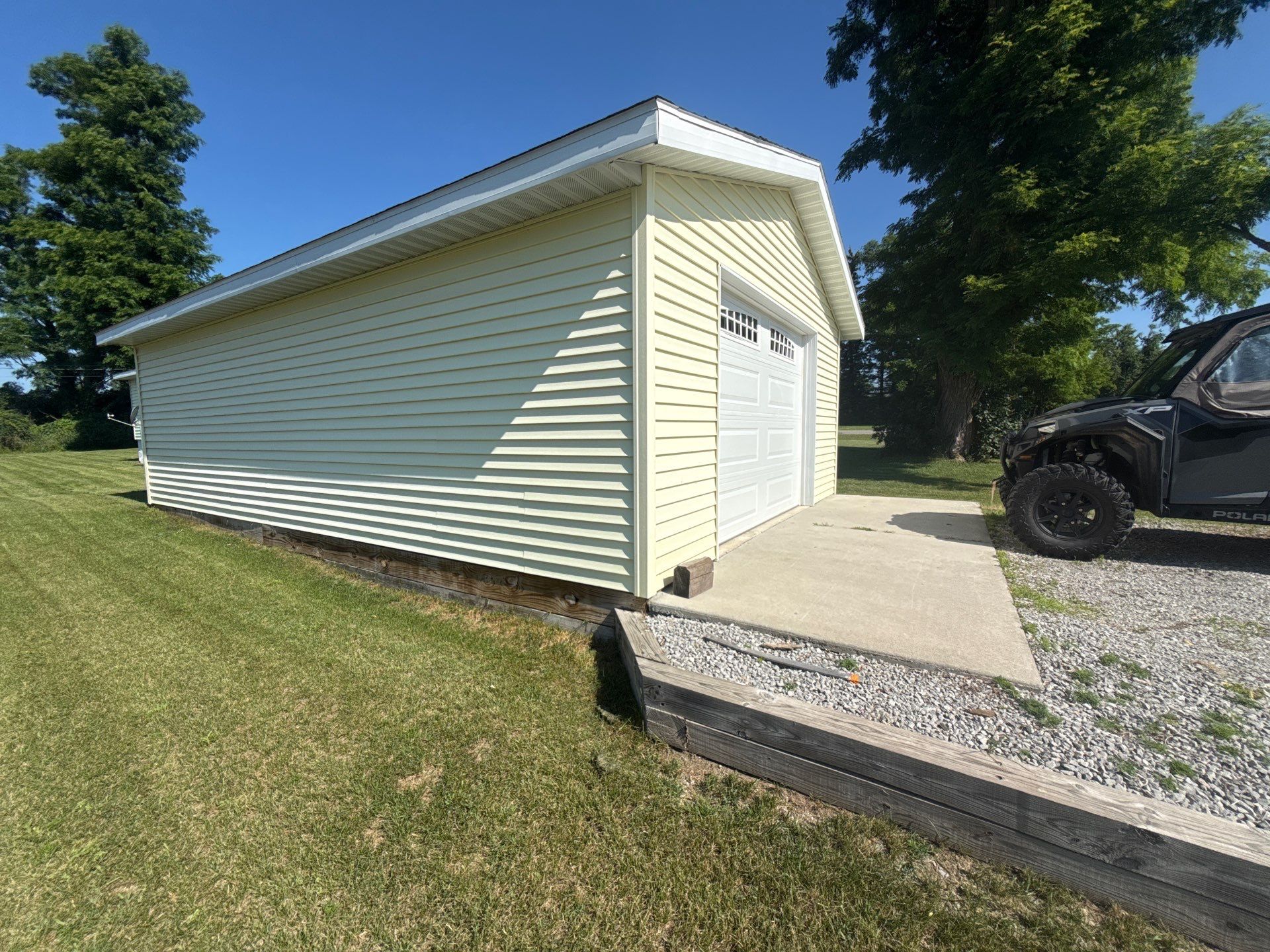White Gutter and Downspout Installation for Lewiston Residence by Rainbow Seamless Systems