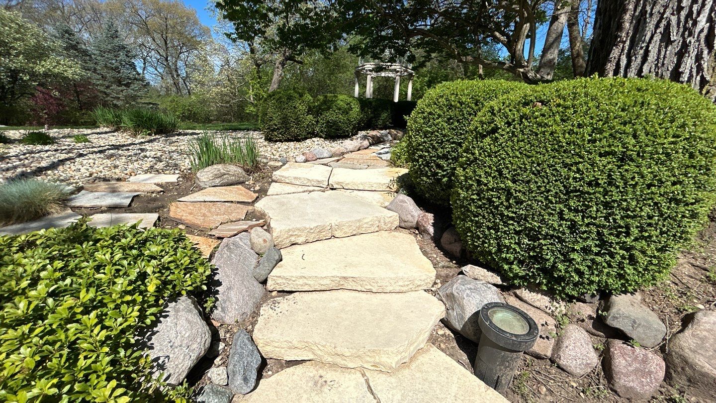 natural stone using Algaecide, soft wash soap by Northern Power Washing LLC.