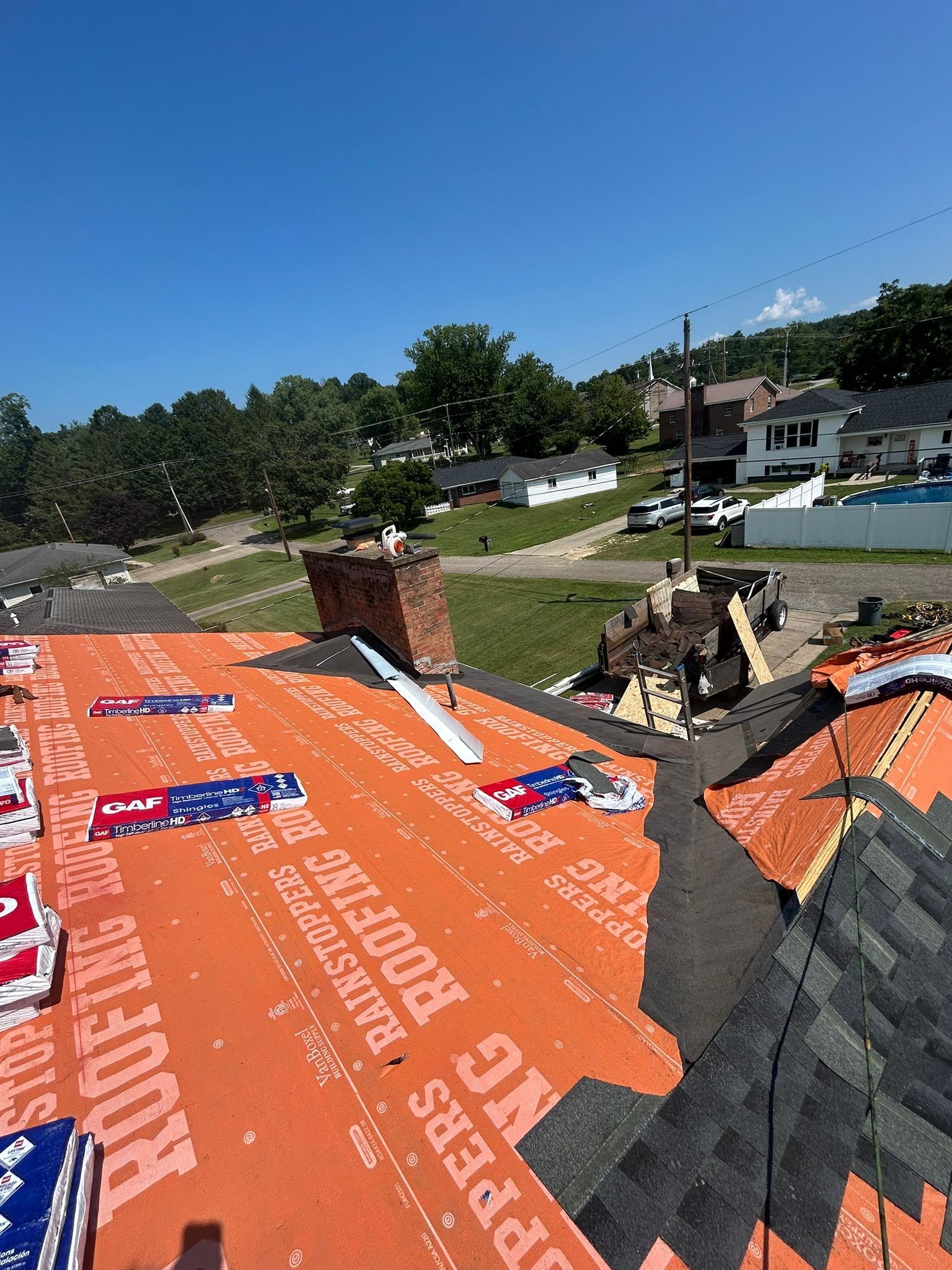Residential Roofing Installation using GAF Timberline HDZ Charcoal by Rainstoppers Roofing