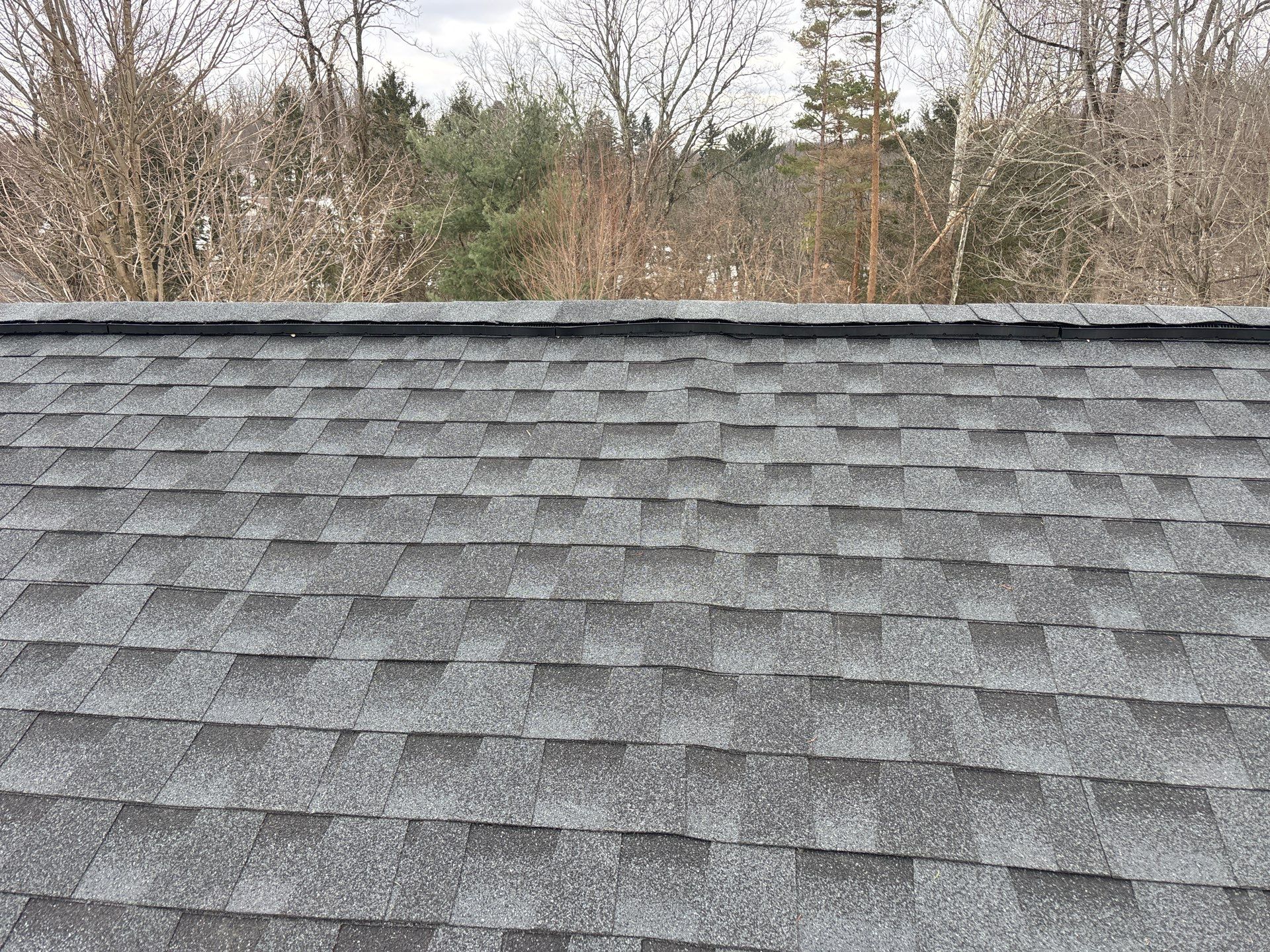 Residential Roofing Installation using GAF Timberline HDZ Charcoal by Rainstoppers Roofing