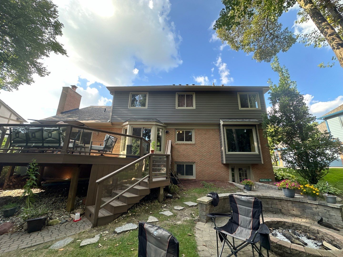 Roof Replacement using Owens Corning Peppercorn and Siding Replacement using Ascend Charcoal Smoke by 180 Contractors