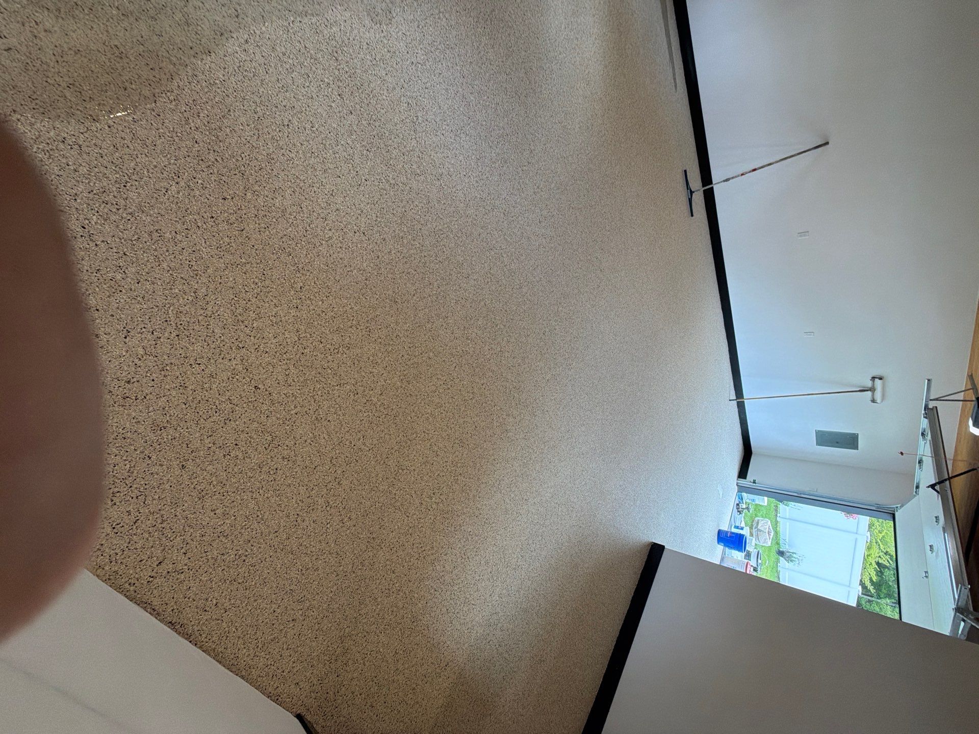 Multi-Room Epoxy Flake Floor Installation Throughout Pentwater Residence by Gordon Painting