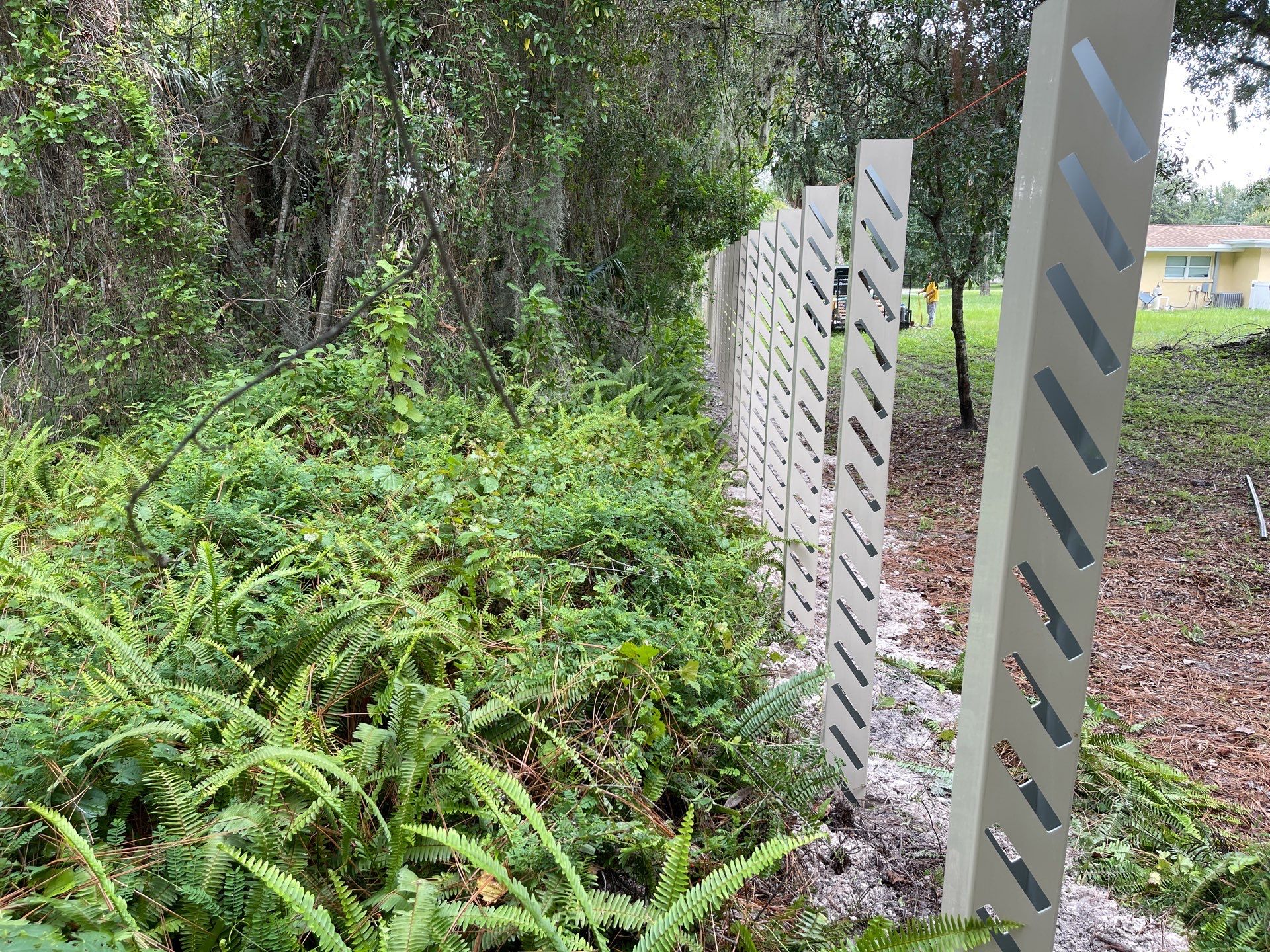 Sarasota, FL. Vinyl Fence Installation using Tan Vinyl Louvered Vinyl Fence by Asap fence and gates, LLC