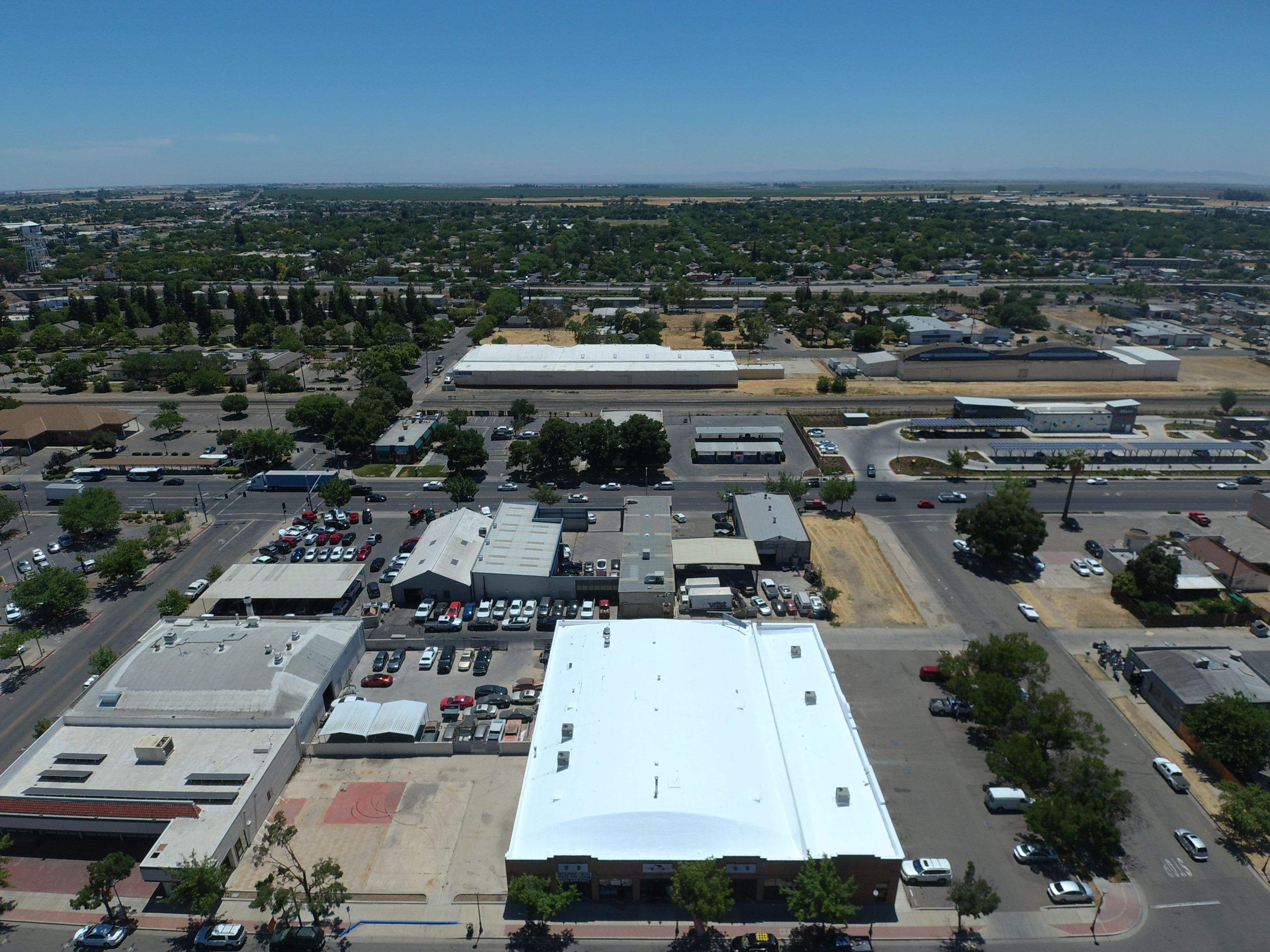 Spray foam and coatings using Conklin Benchmark/PUMA XL coatings and spray foam by Straight Edge Roofing Inc