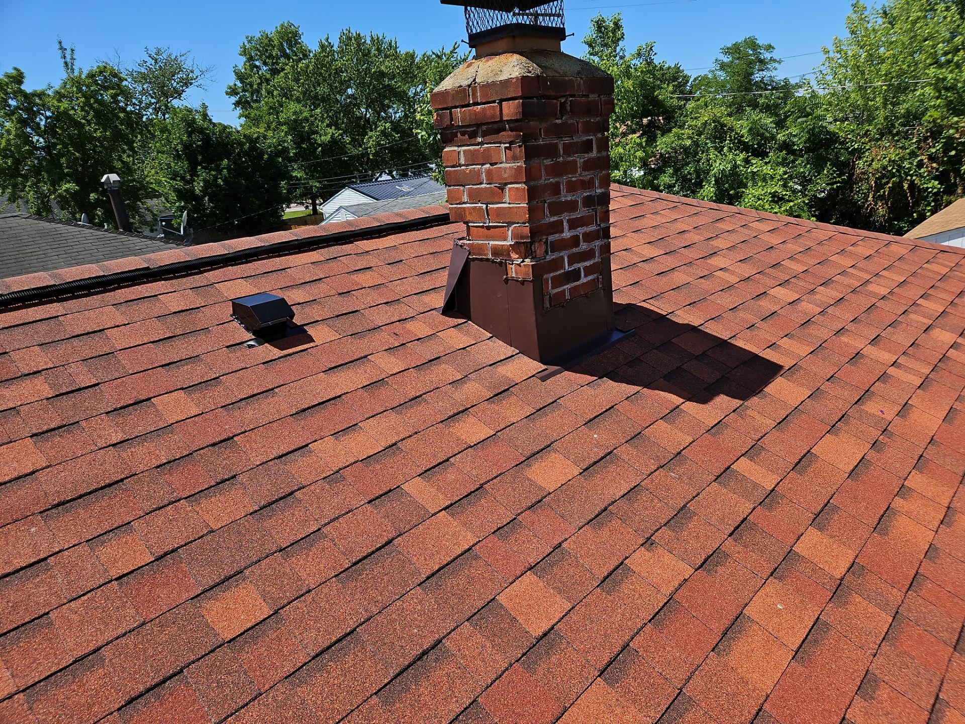 Residential Roof Replacement using Owens Corning Terra Cotta by Absolute Roofing and Construction