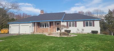 Asphalt shingles professionally installed in Cromwell, CT by DiGiorgi Roofing & Siding INC