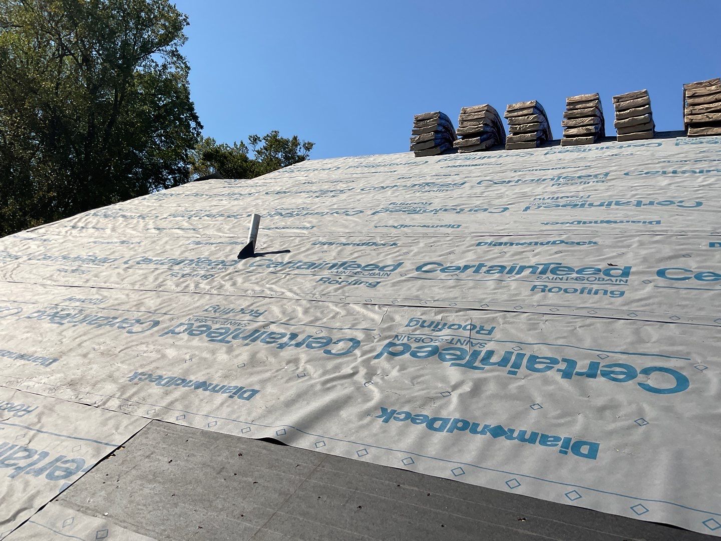 Residential Roofing Installation by Alpha Design Services