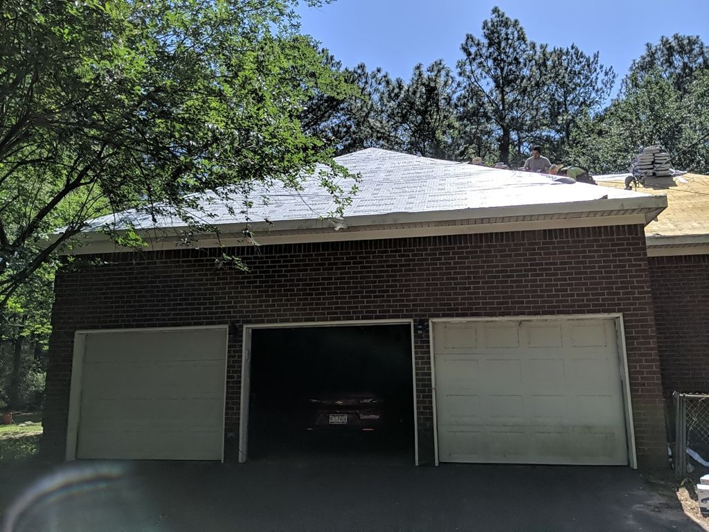 Residential Roofing Installation using Roof Replacement by American Roofing & Construction LLC