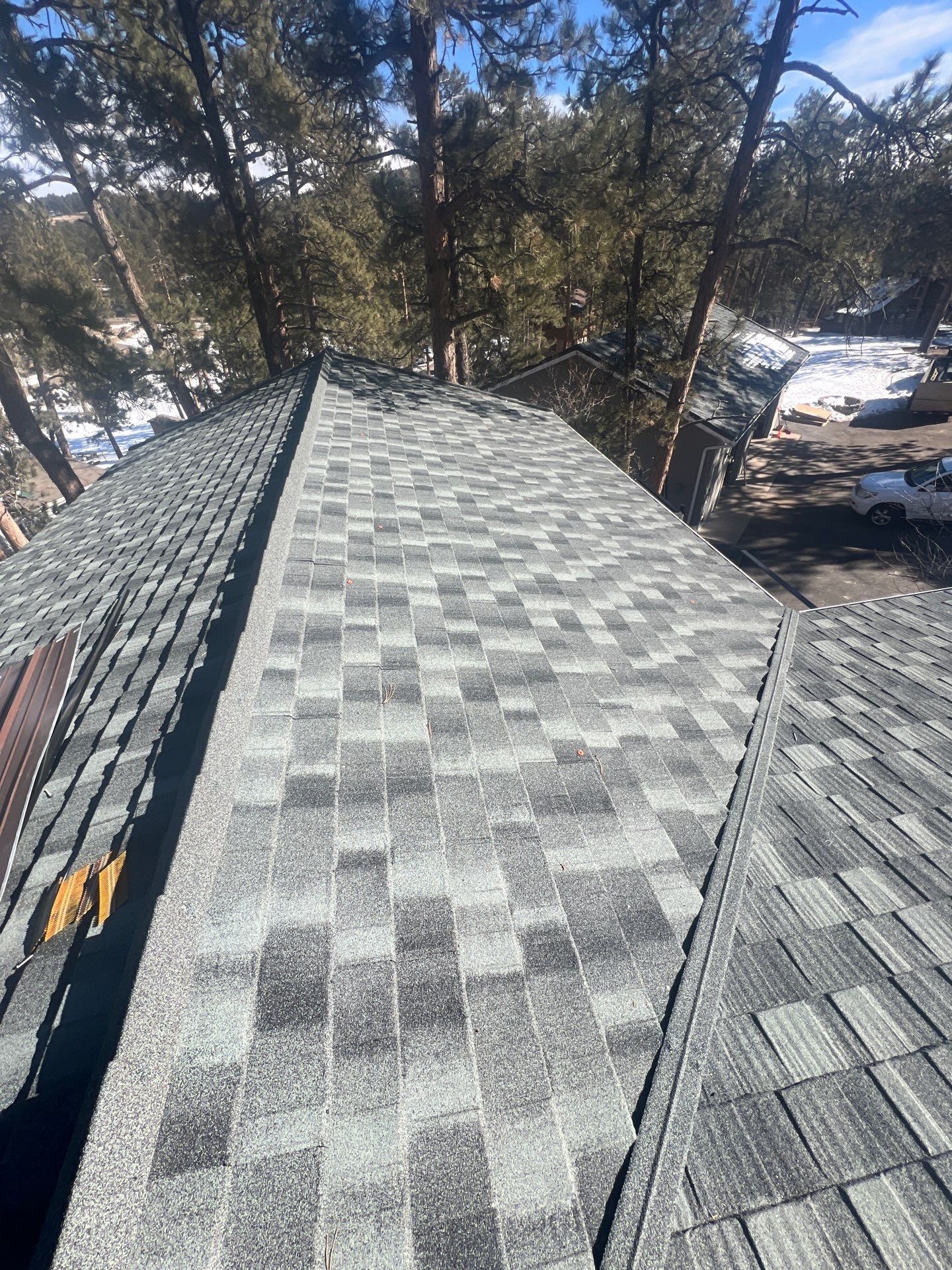 Residential Roofing Installation using Stone Coated Steel by Blue Peaks Roofing LLC 