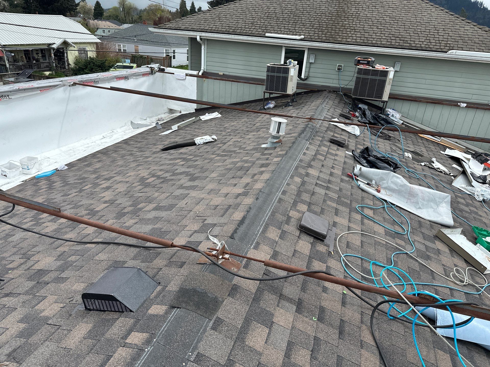 Commercial Roofing Installation using IKO Dynasty & GAF 60Mil TPO by Orezona Building & Roofing Company, Inc.