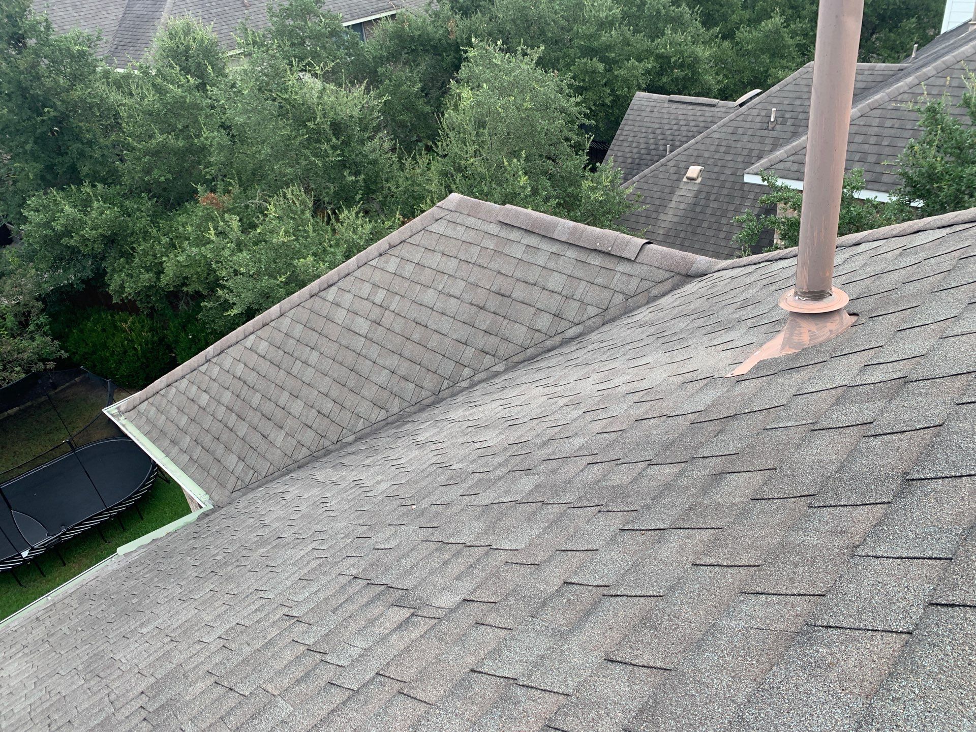 Hail Damage Restoration and Asphalt Shingle Roof Replacement in Austin by Caliber Restoration LLC