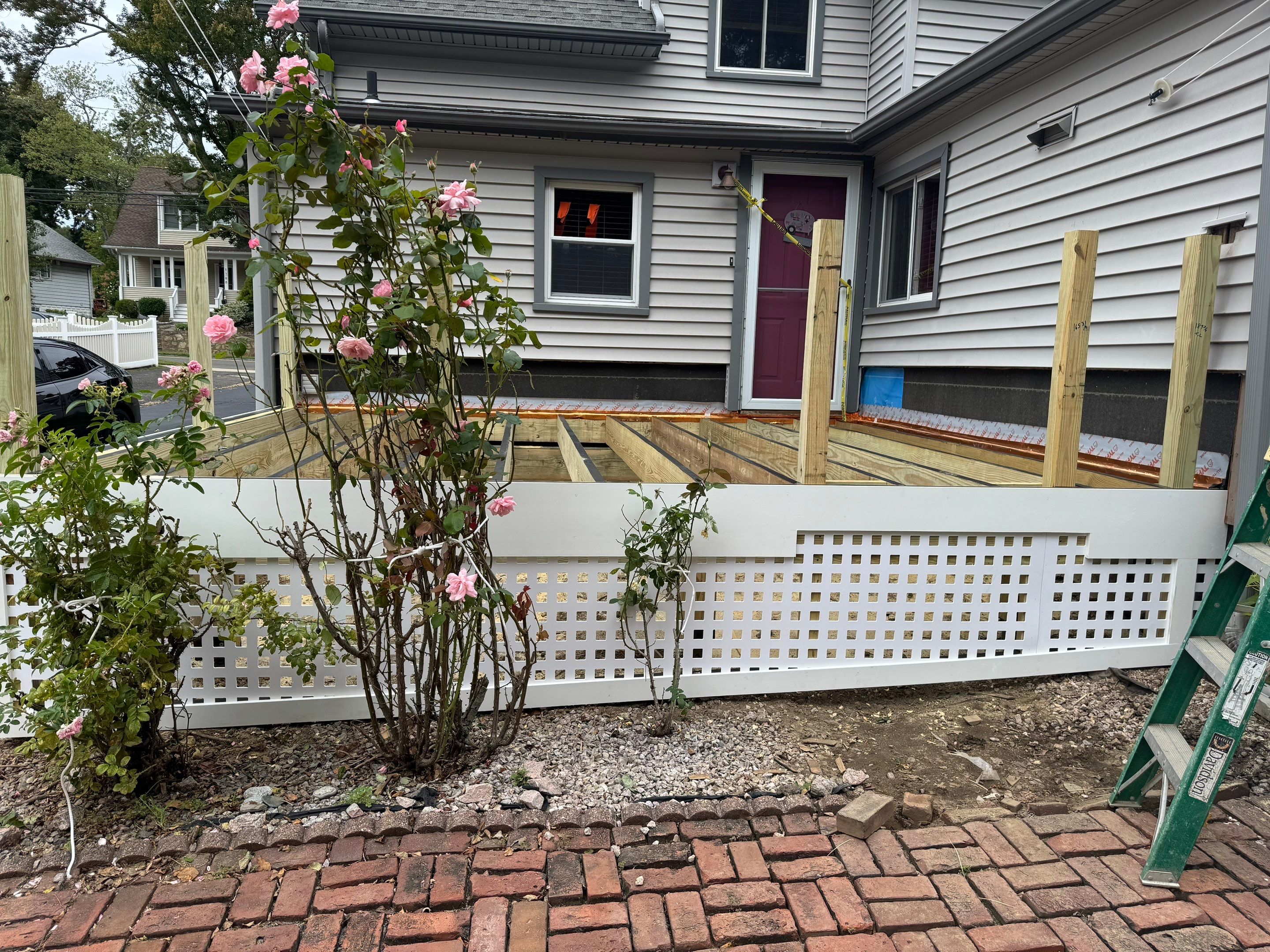 Deck Replacement using Trex Lineage Rainier with matching Cocktail rail and Lattice by DiGiorgi Roofing and Siding Inc