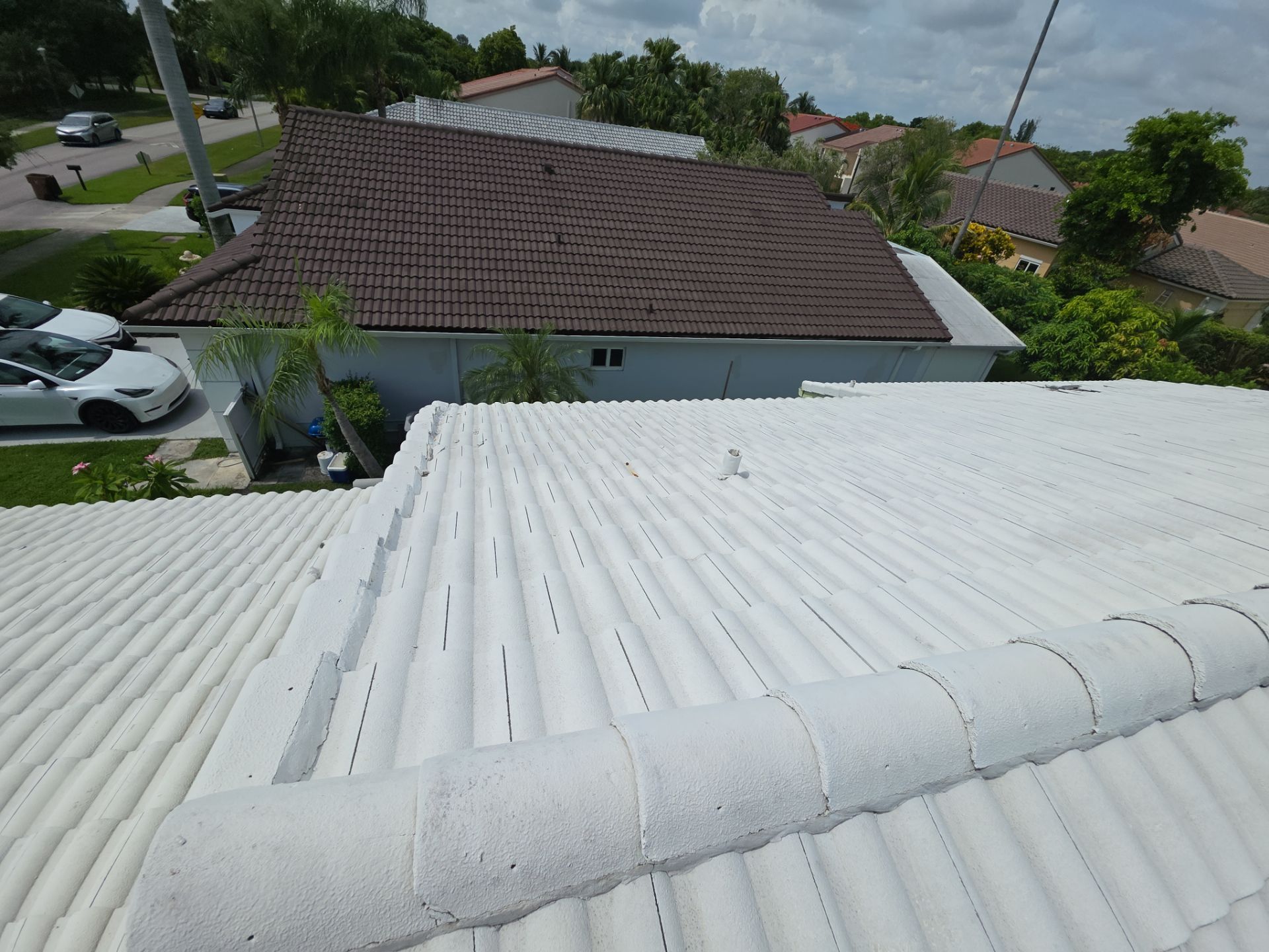 Concrete Tile Roof Repair and Wood Fascia Restoration in Deerfield Beach by Aastro Roofing