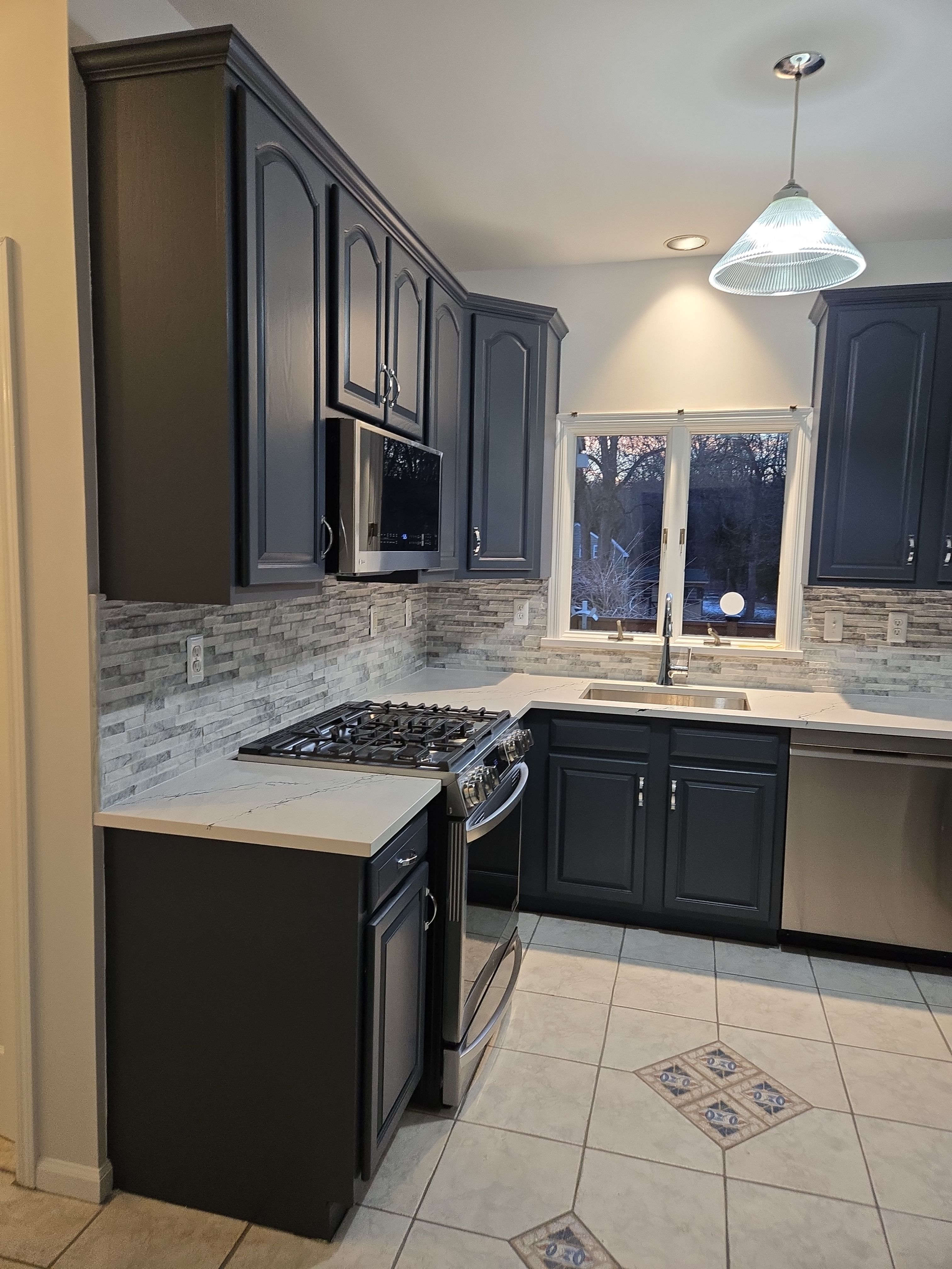 Cabinet Refinishing using Benjamin Moore Command by Spectrum Painting, LLC