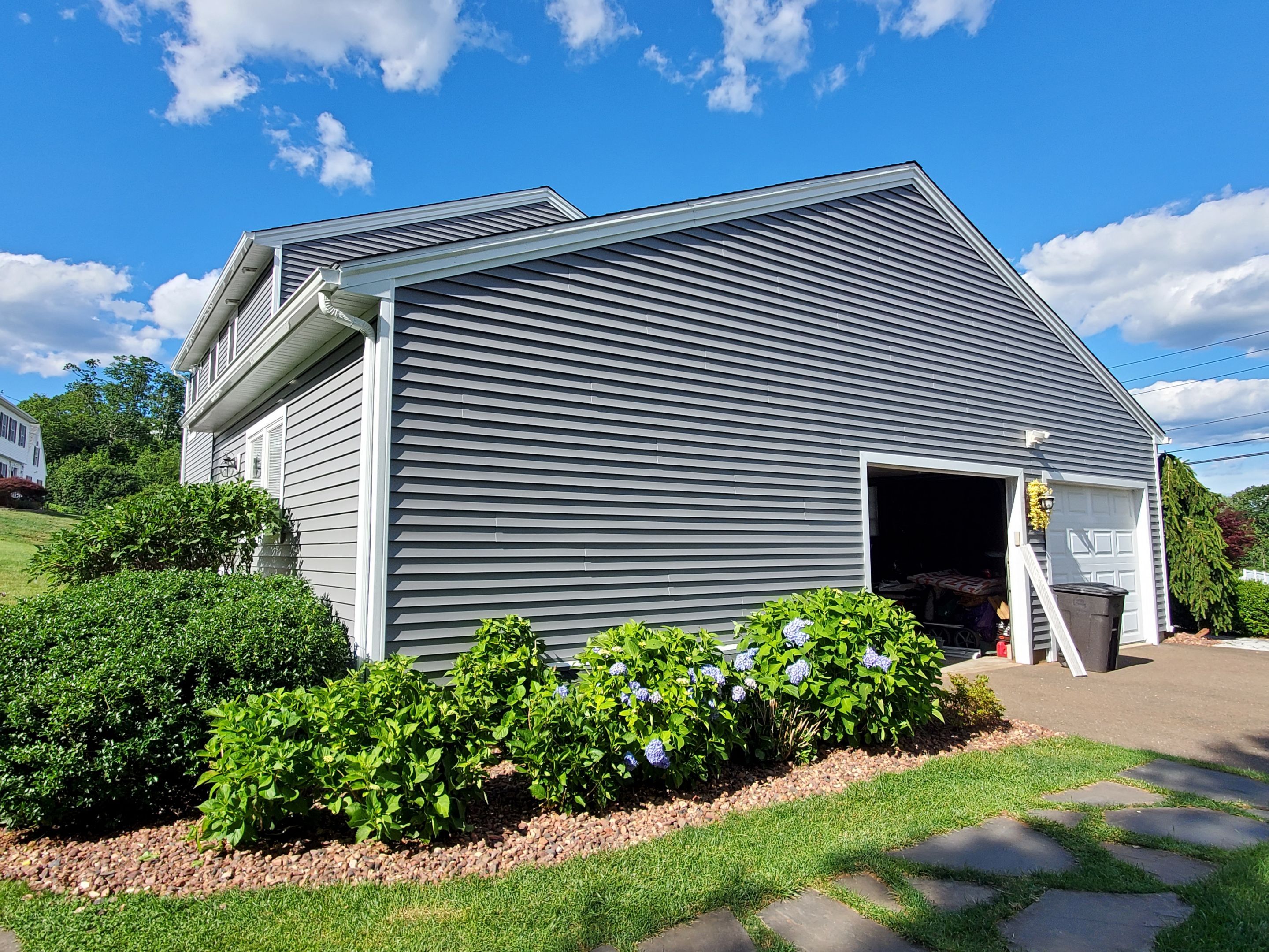 Siding Installation using Certainteed Monogram Charcoal gray and Owens Corning Versetta Stone Sterling by A Plus Exterior