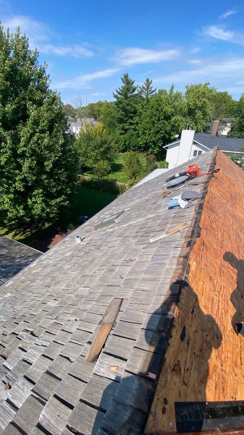 Cedar Shake Roof Replacement by Custom Installations