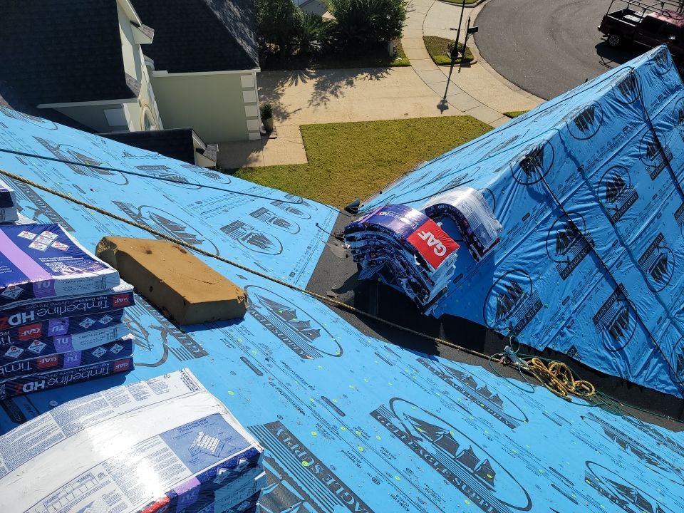 Residential Roofing Installation using Roof Replacement by American Roofing & Construction LLC