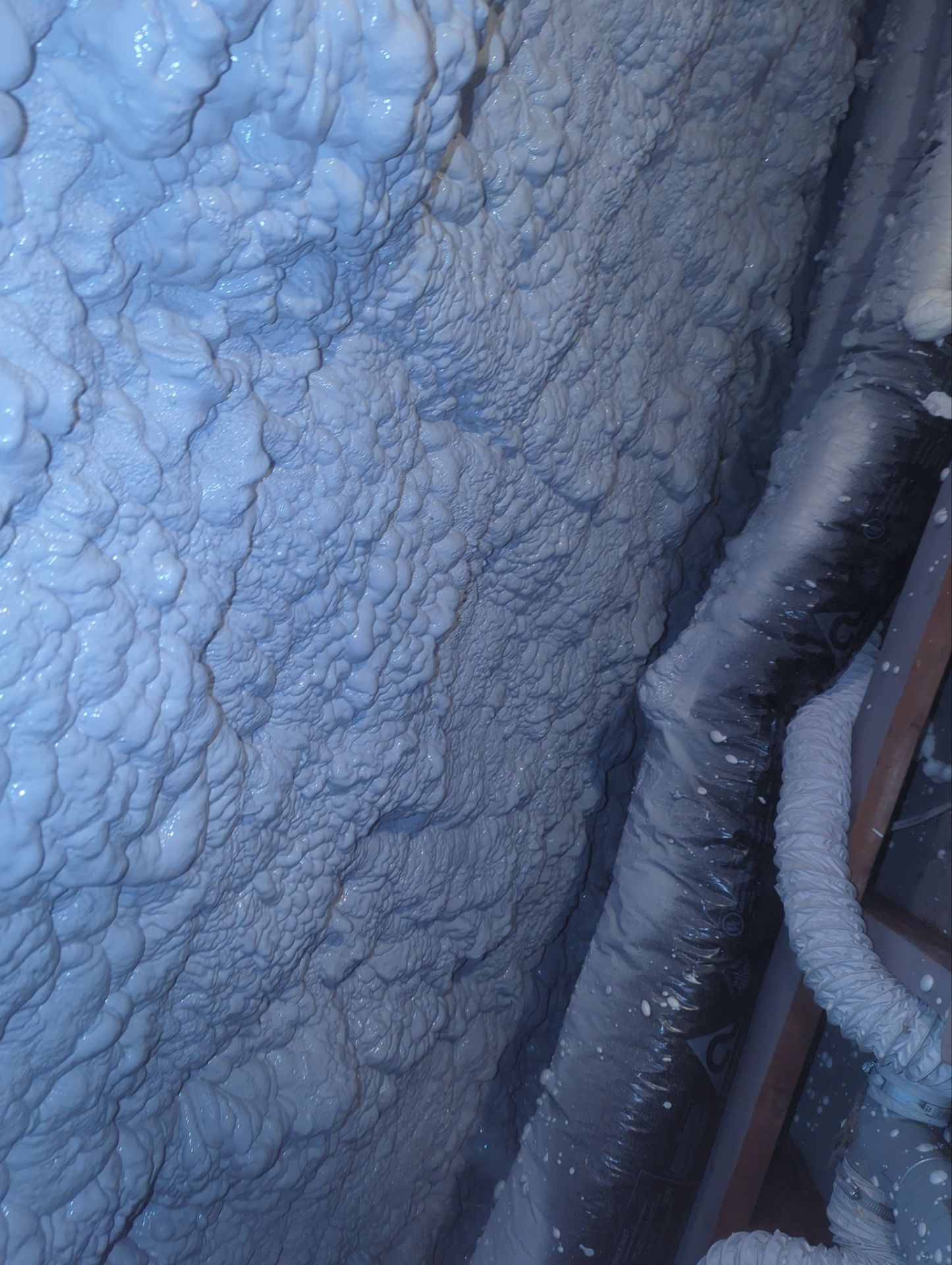 Attic Retrofit using open cell spray foam by NYS Foam & Energy