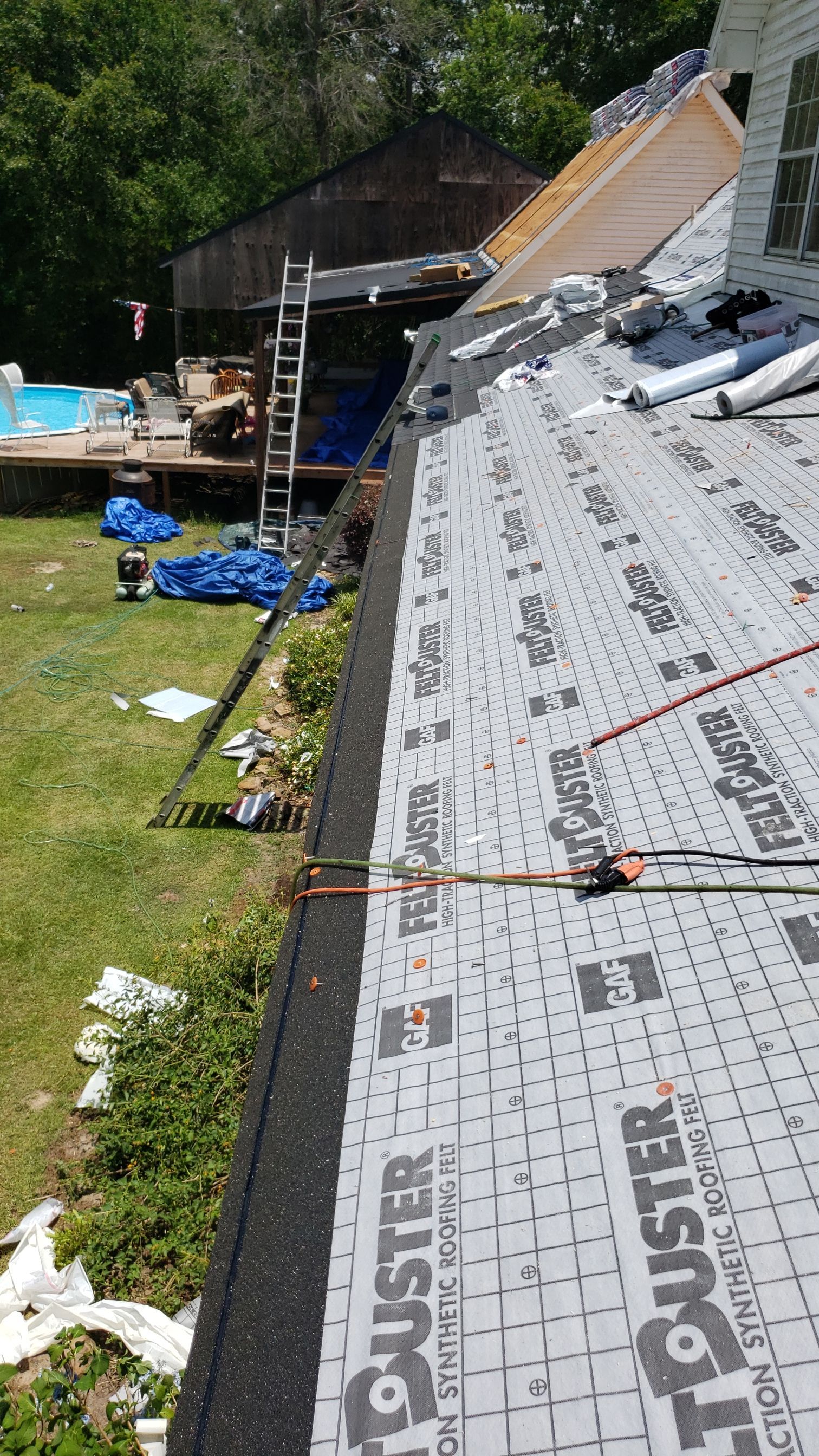 Residential Roofing Installation using Roof Replacement by American Roofing & Construction LLC