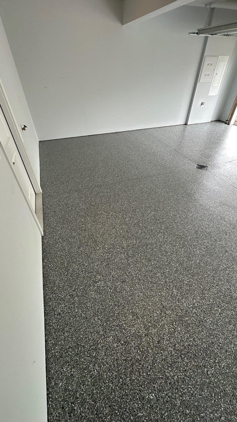 Porch + Garage Project in Evans City by Floors in a Day, Inc