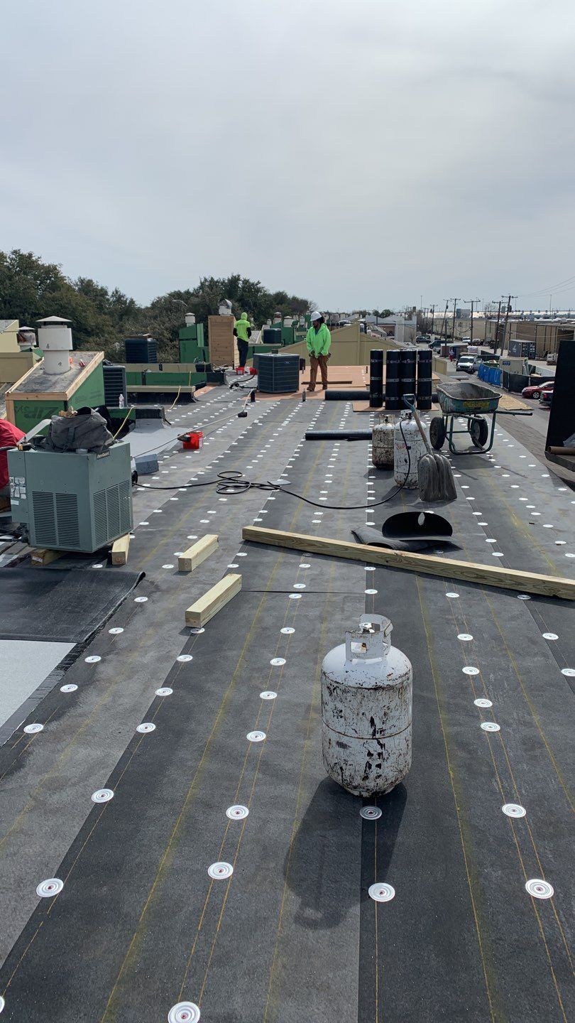 Apartment Roof Replacement by First Out Roofing 
