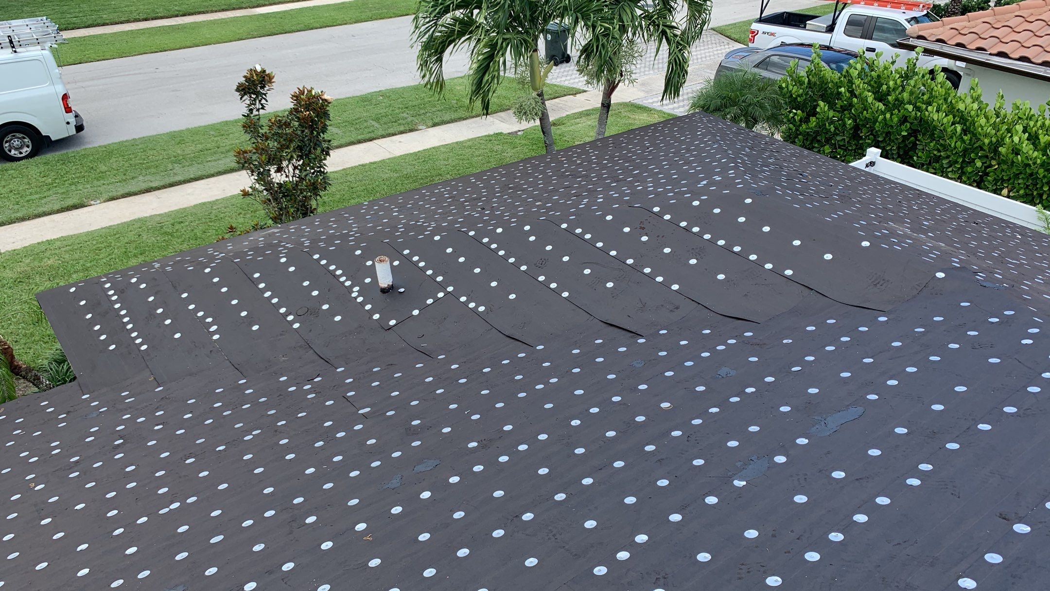 Residential Roofing Installation using 1" Nail strip metal roof by BLUES BROTHERS ROOFING