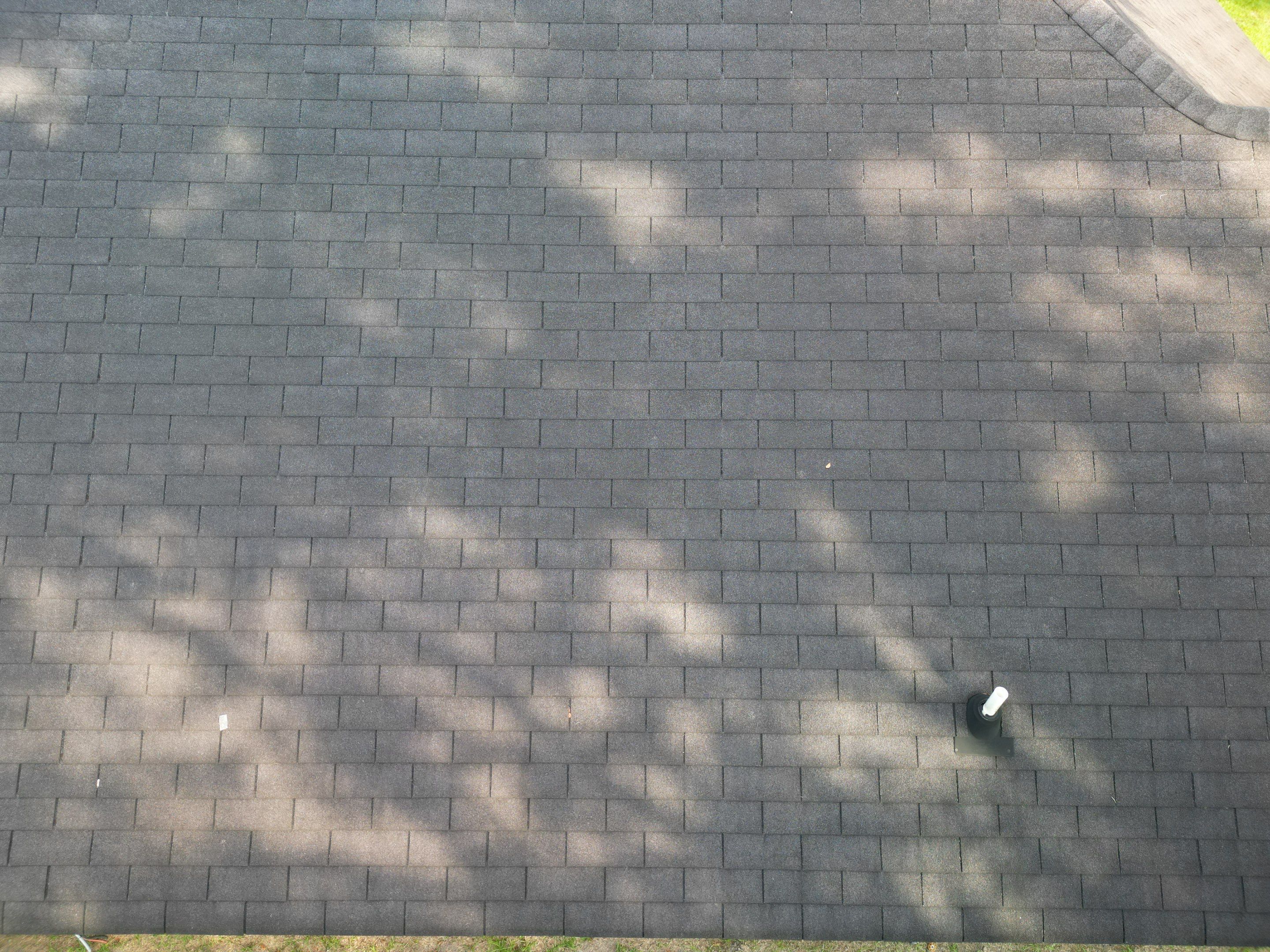 Residential Roofing Installation using Benton 26Ga 1inc Snapcock Metal Roof KYNAR Matte Black by Talya Roofing