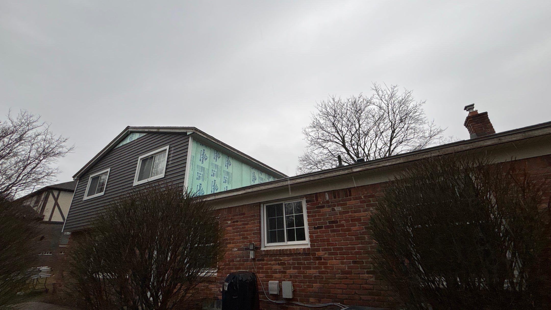 Siding Replacement using Alside Charcoal Smoke and Roof Replacement using Owens Corning Peppercorn by 180 Contractors
