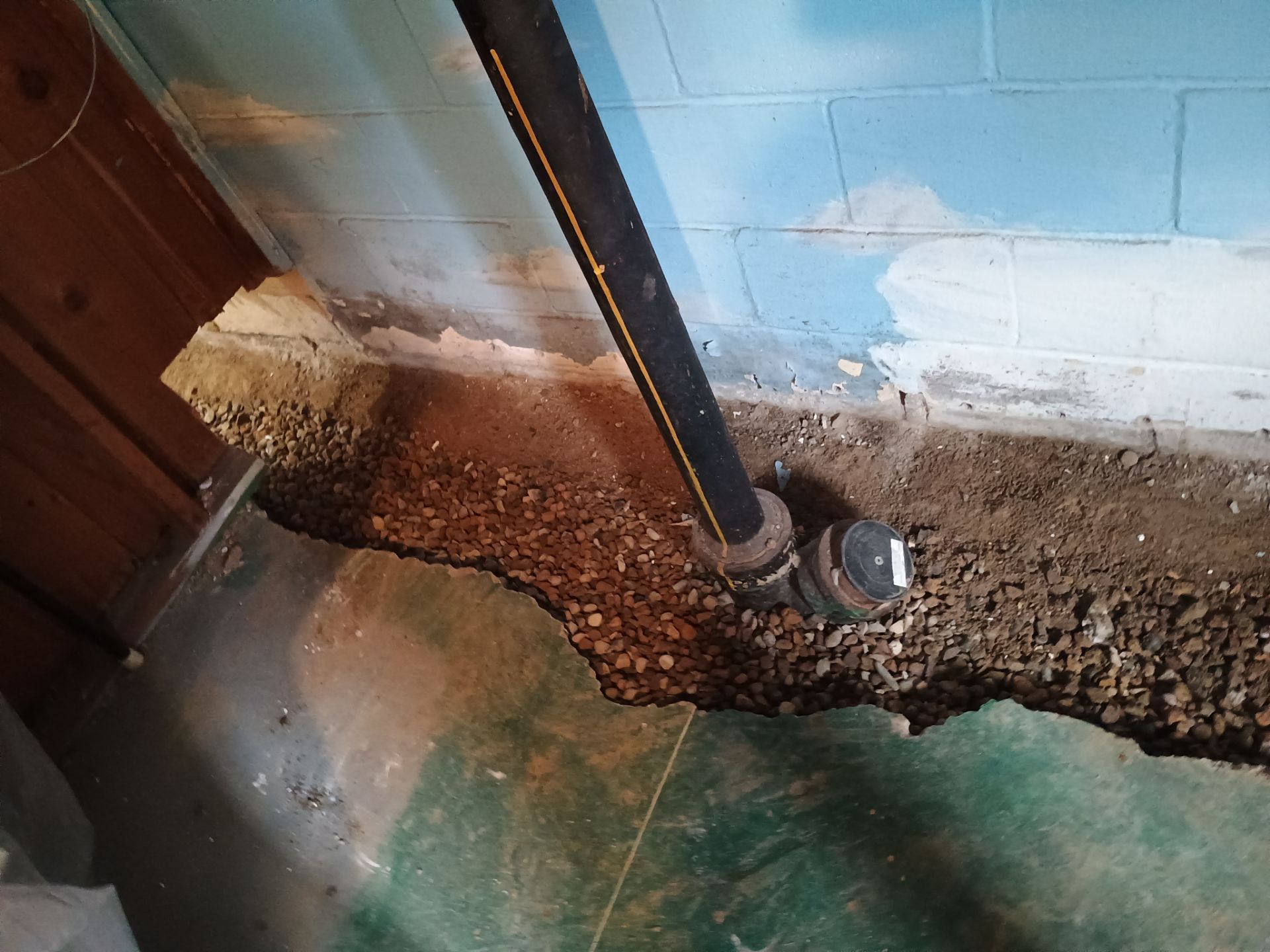 Completing the Connection for Lisa's Drain Tile System by Waterproofing Northeast