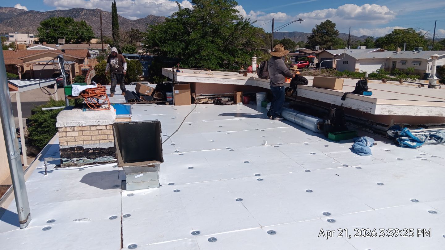 Residential TPO Roof Replacement and skylight replacement in Albuquerque by Doyle Roof Masters Inc