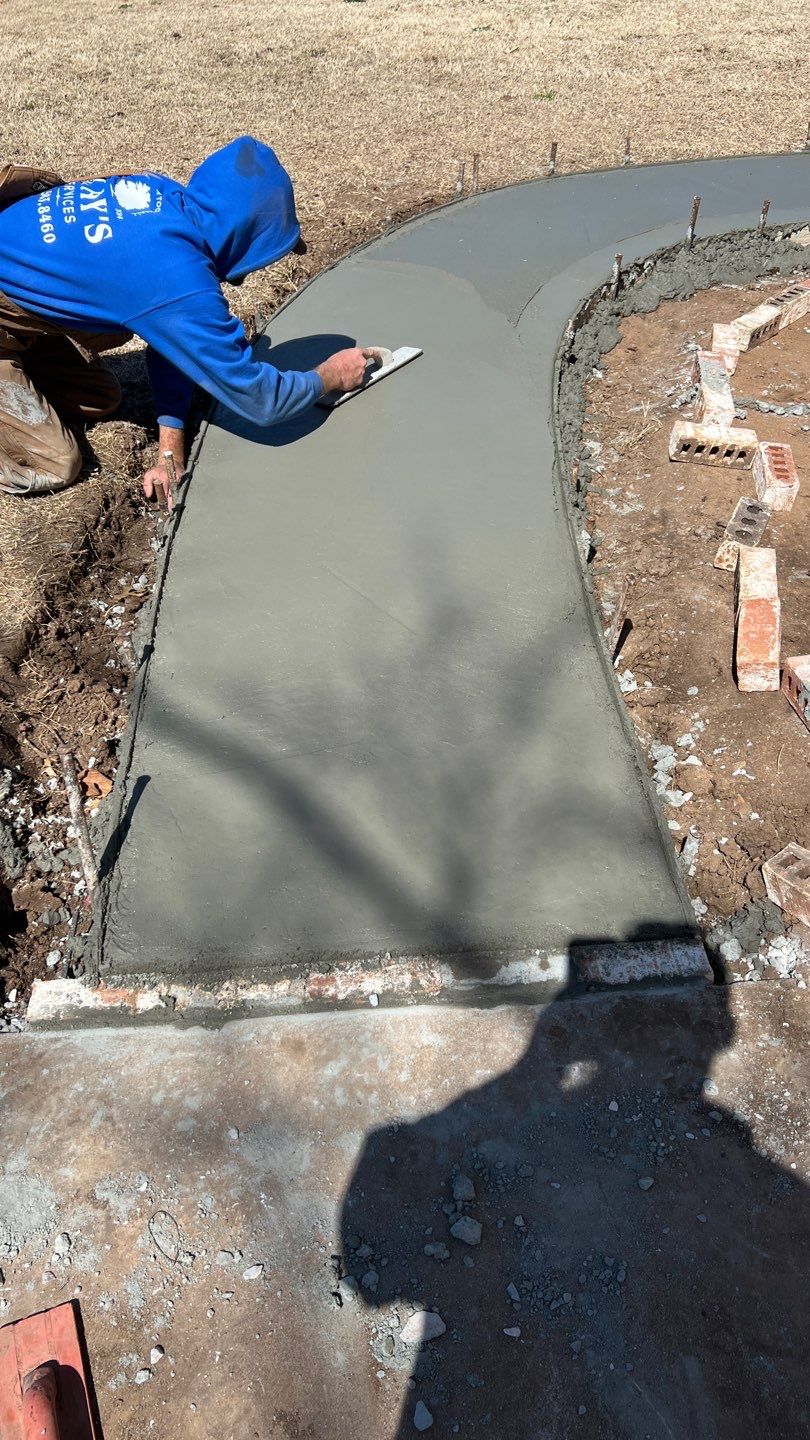 Concrete sidewalk using Concrete by Clays Services Inc