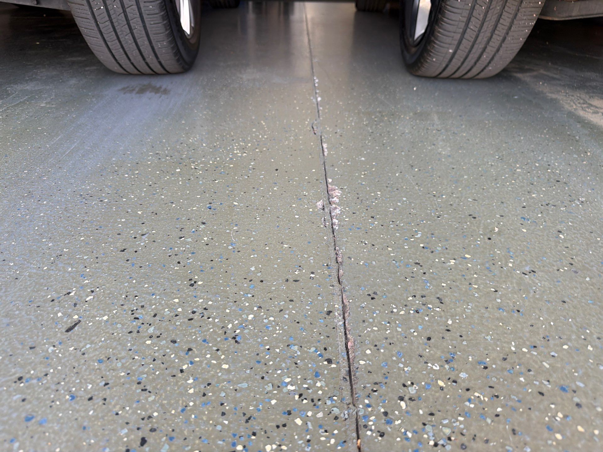 Multi-Car Garage Concrete Coating with Coyote Flake Finish in Sioux Falls by Select Painting, Coatings & Garage Cabinets