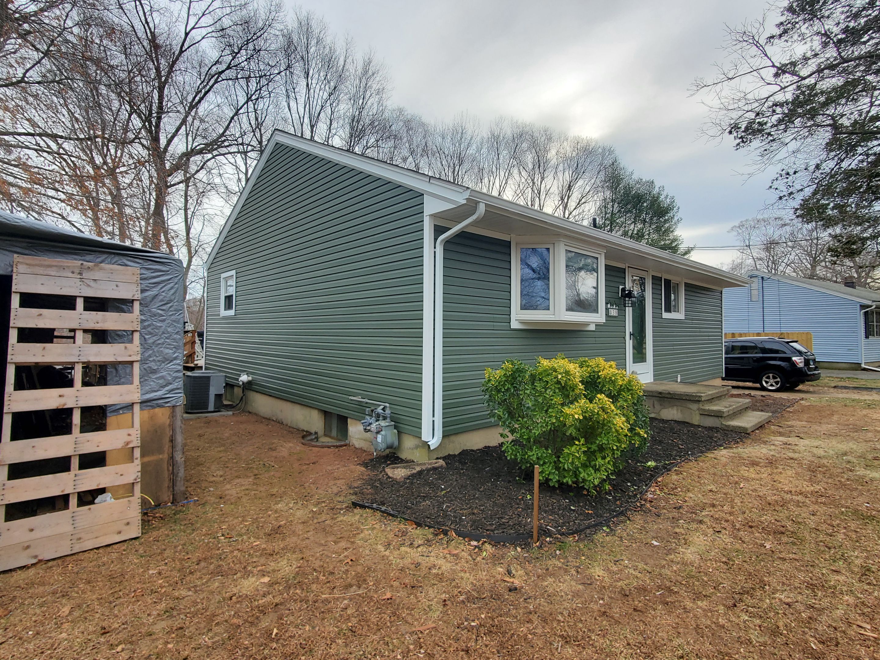 Siding Installation using Certainteed Mainstreet Forest Green by A Plus Exterior