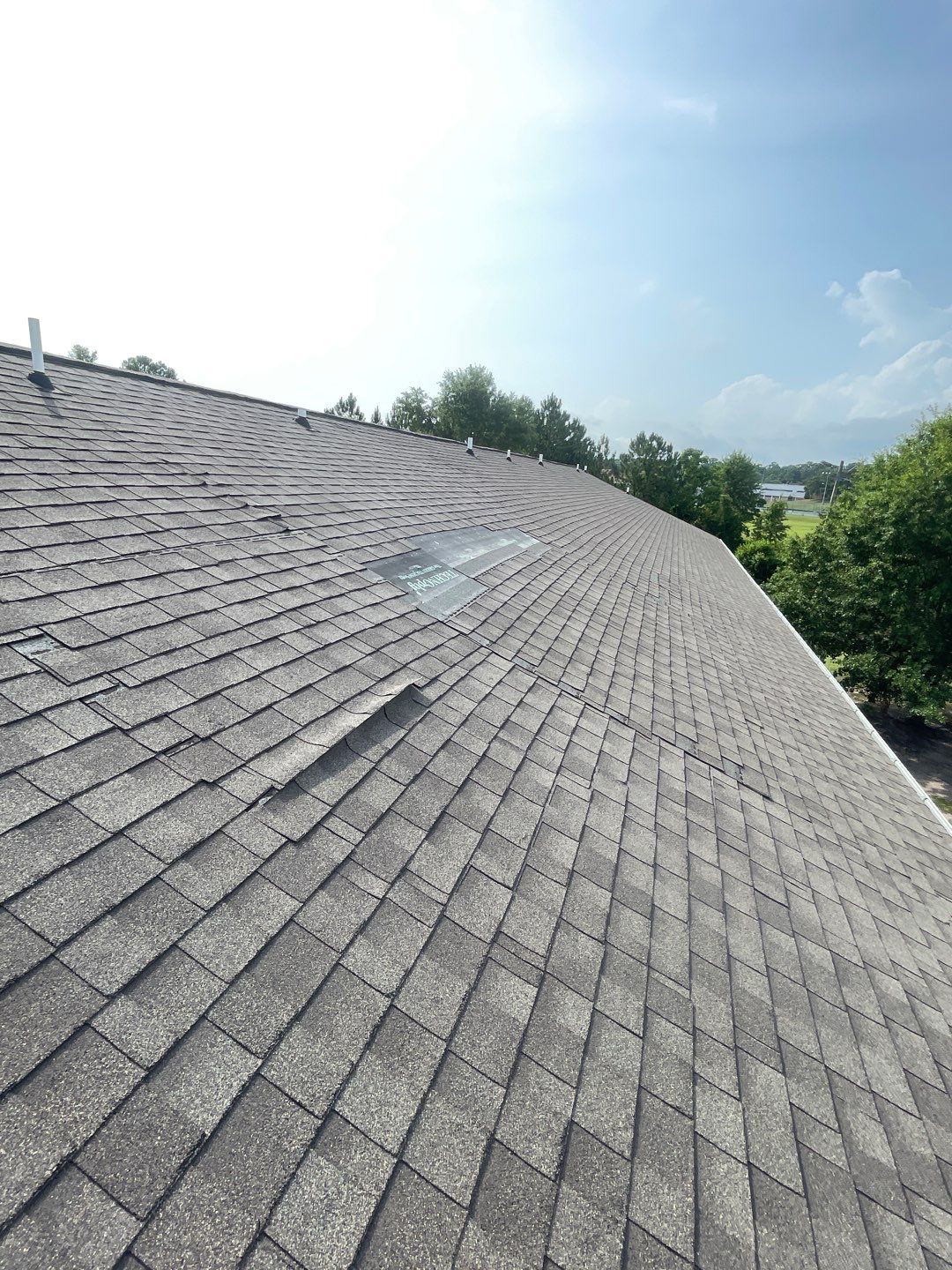 Residential Roofing Installation using Roof Replacement by American Roofing & Construction LLC