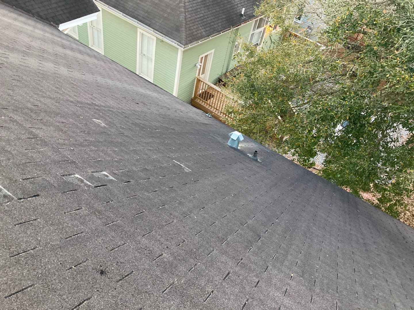 Residential Roofing Installation using Roof Replacement by American Roofing & Construction LLC
