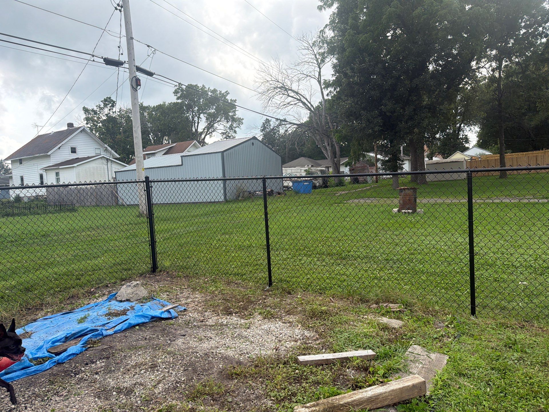 Residential Black Chain Link Fence Installation in Reinbeck by Perfect Picket Fence and Stain