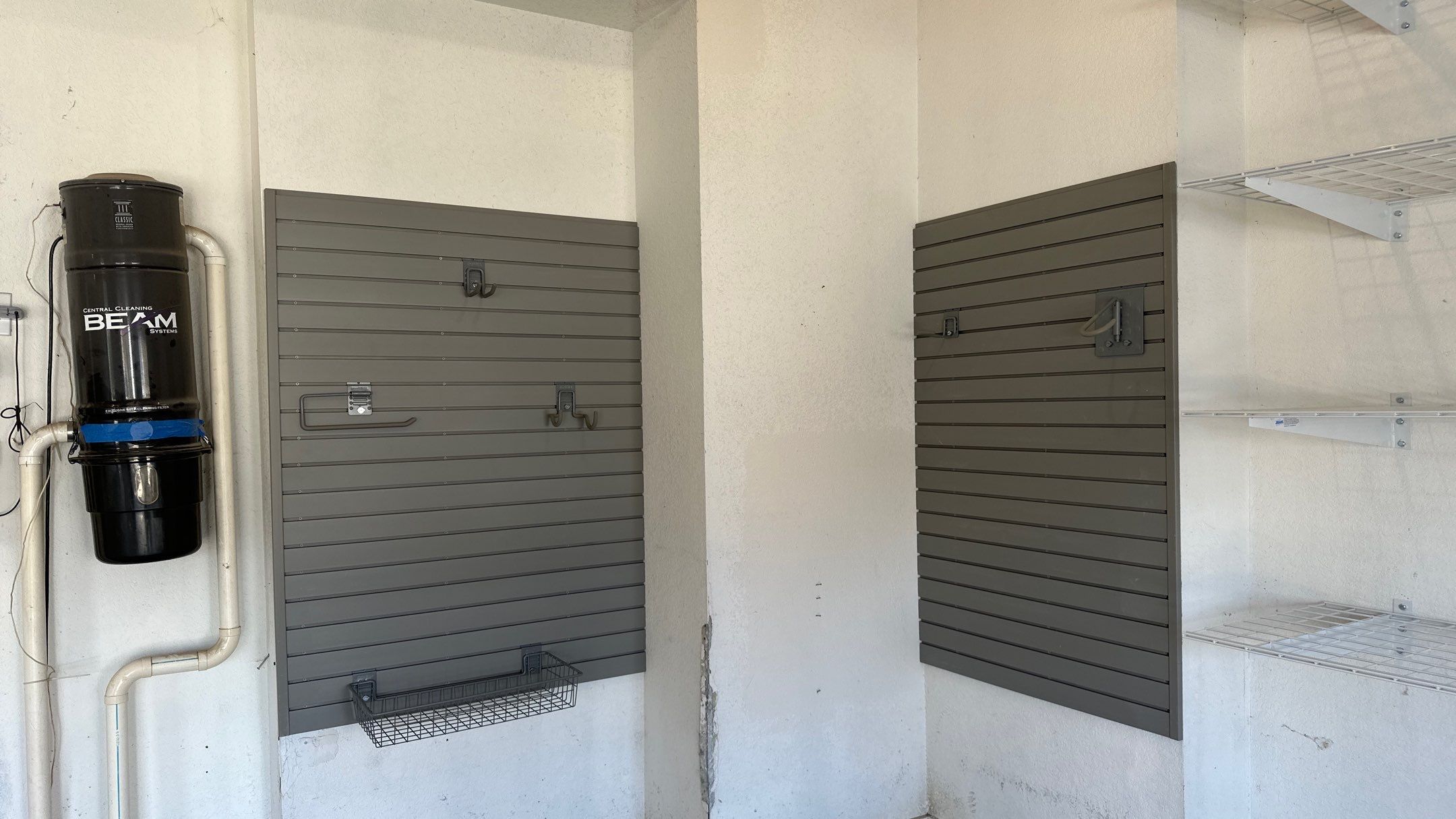 Melissa L. upgraded her garage with slatwall and overhead racks by Banner Garage
