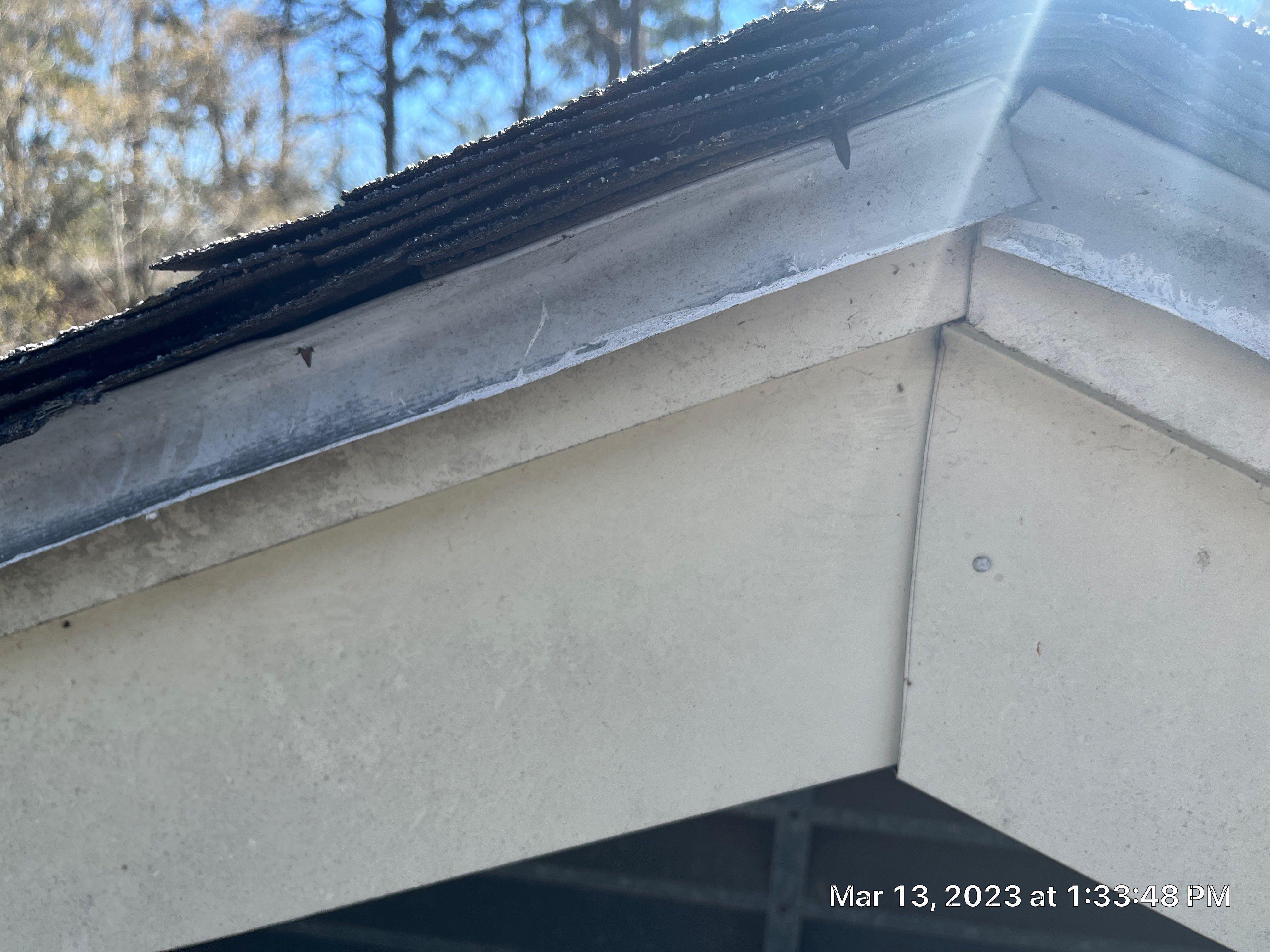 Residential Roofing Installation using 26 Gauge Colored Panels by Hostetler Roofing