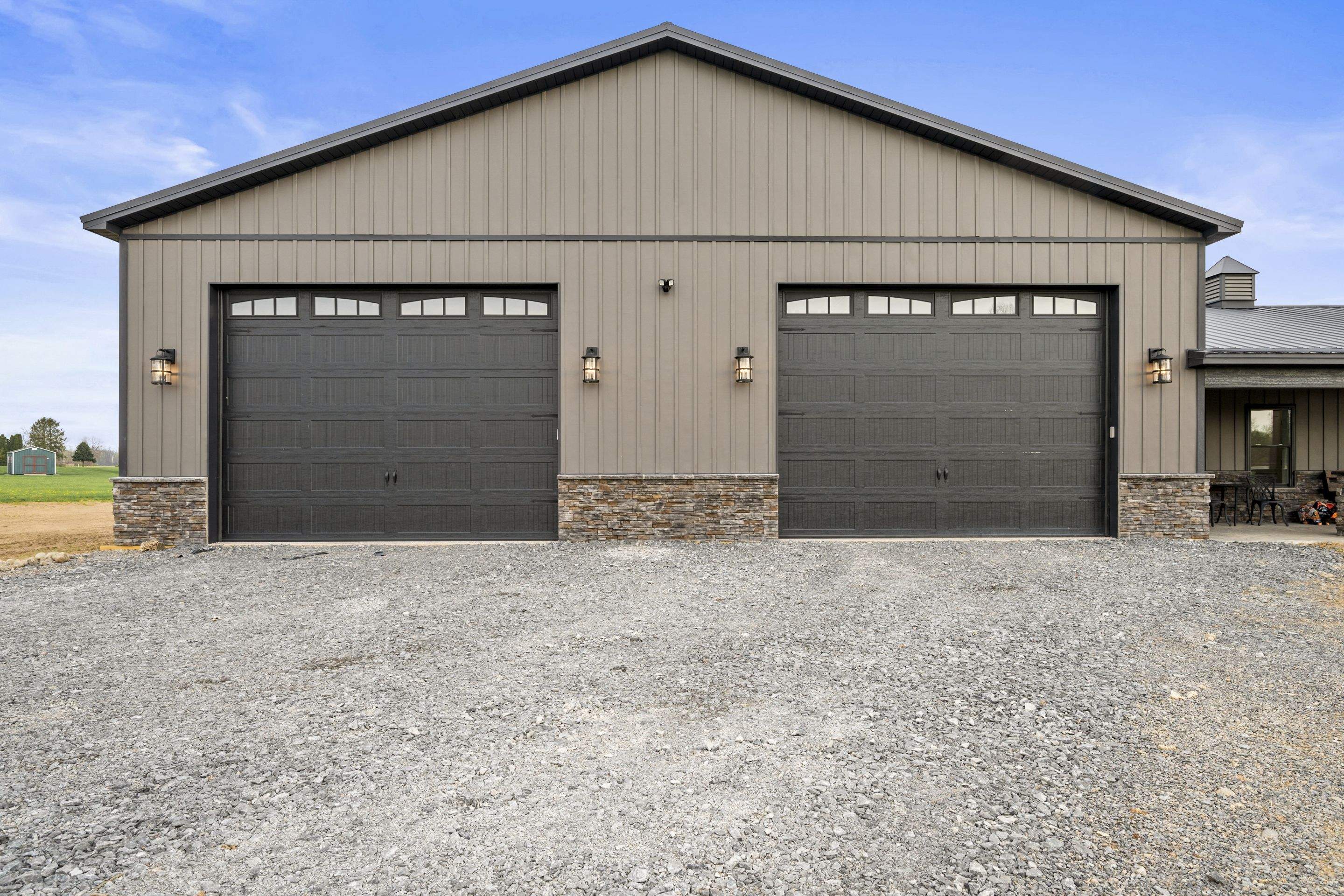 Barndominium  using Textured Board & Batton by Horst Custom Homes 