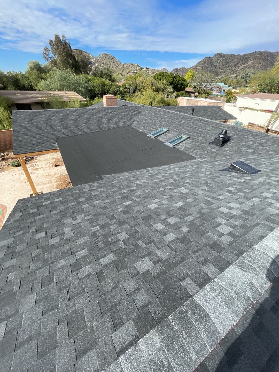 Onyx Black Shingles by Reimagine Roofing