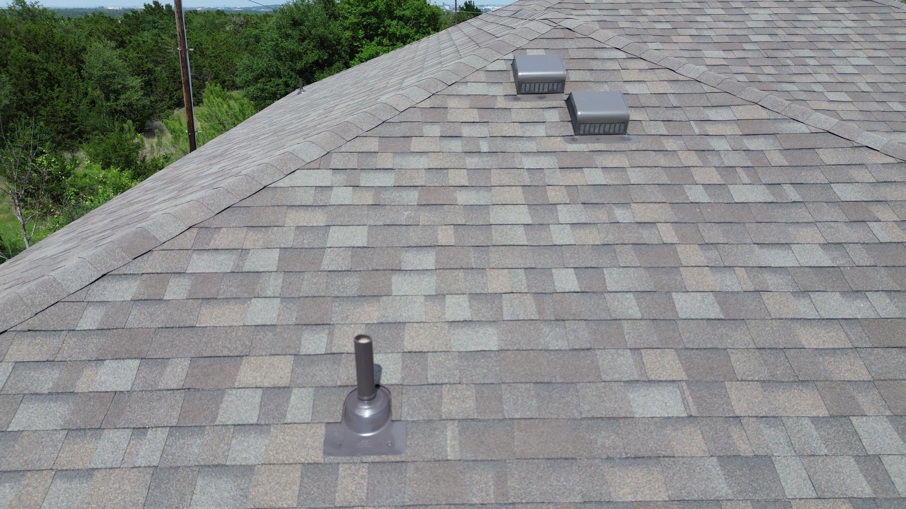 Roof Replacement in Round Rock, TX | Owens Corning Oakridge Driftwood Shingles by Kstylez Roofing & Construction