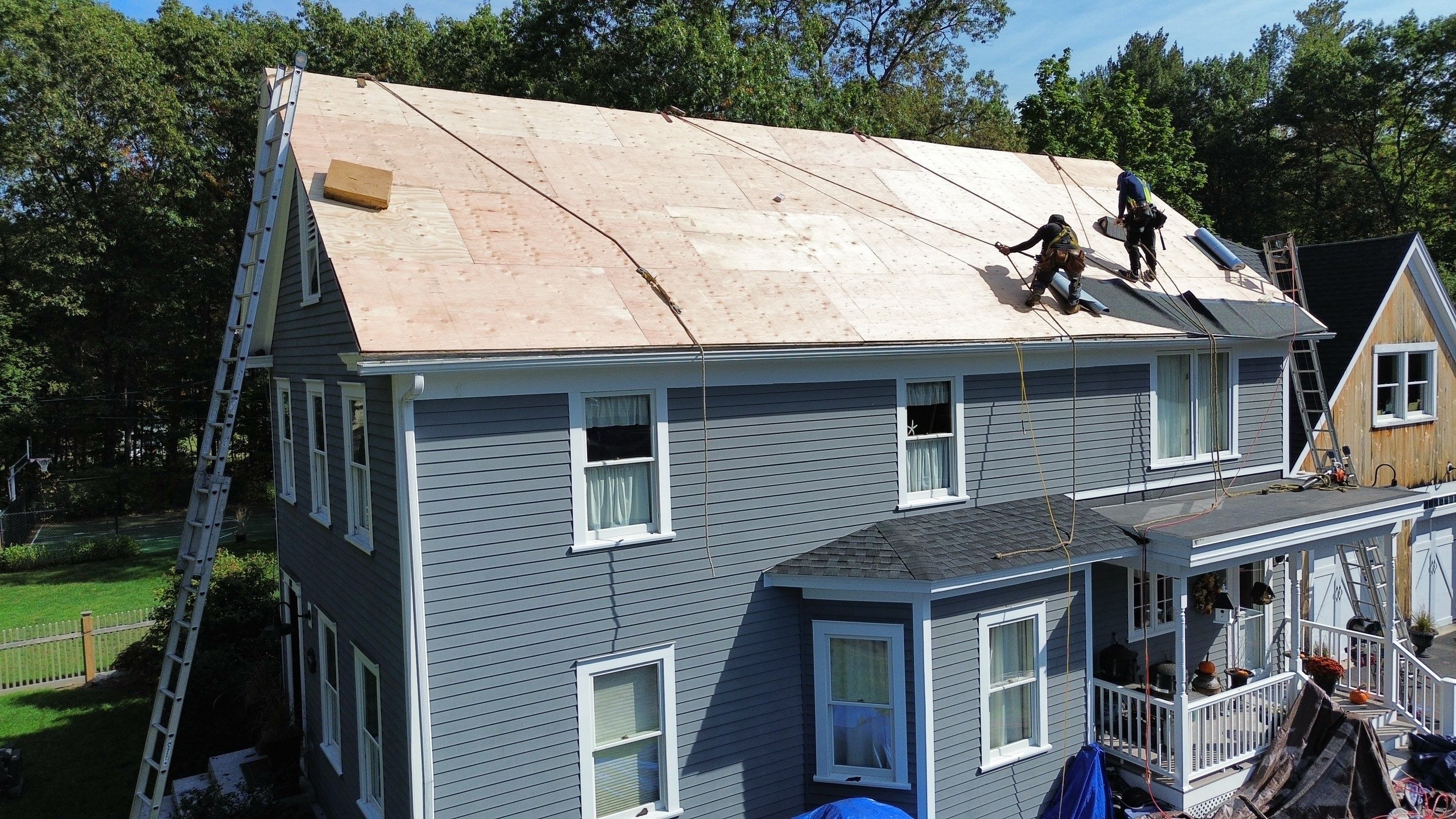 Roof Replacement & Chimney Removal – Westford, MA by Mighty Dog Roofing of Greater Middlesex County