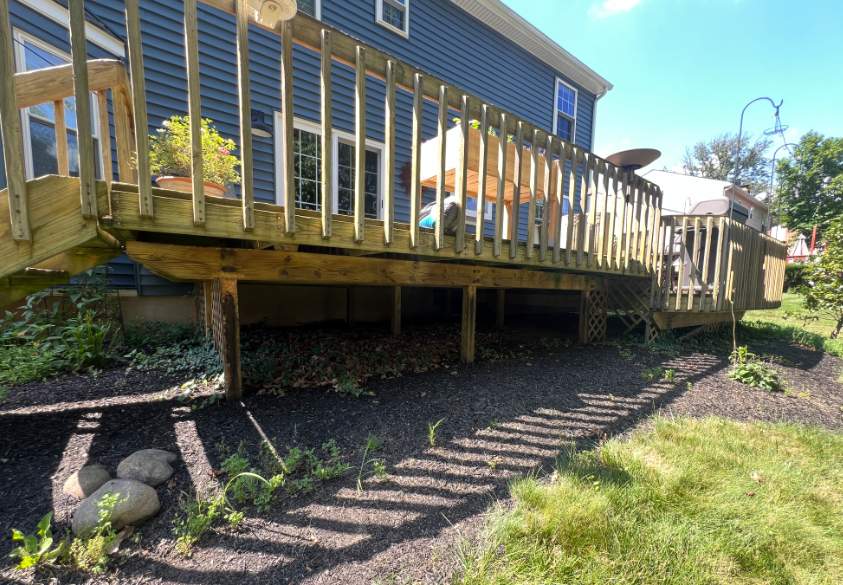 Deck resurface with Trex and cable rails by deck guardian