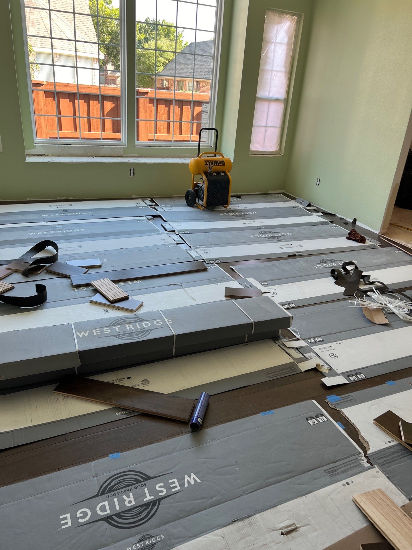 In Progress - Nail Down Prefinished Birch will give this home a warm Western look. by Bernard Hardwood Floors