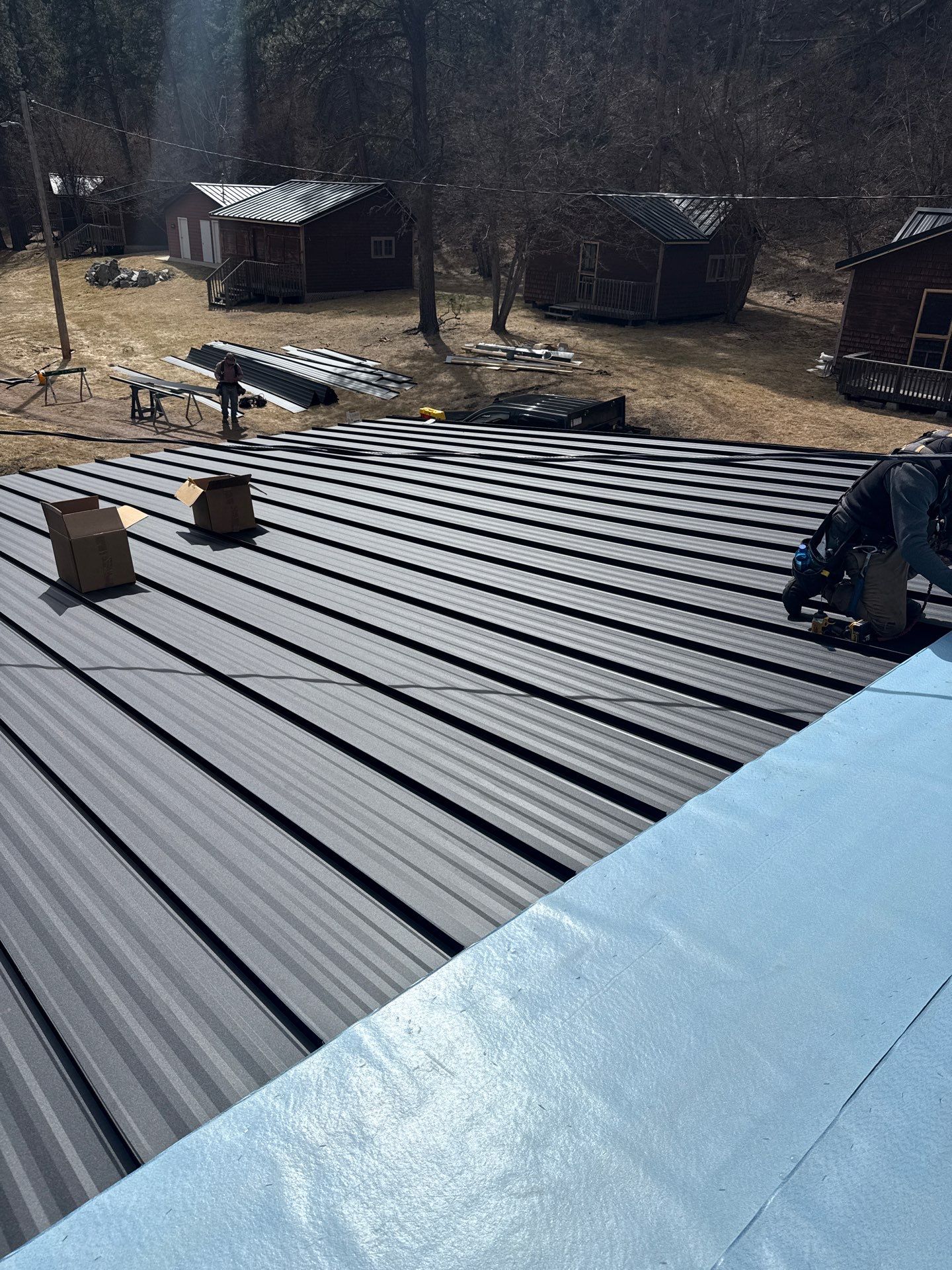 Residential Roofing Installation using Steel Roofing by Weather-Tite Exteriors LLC