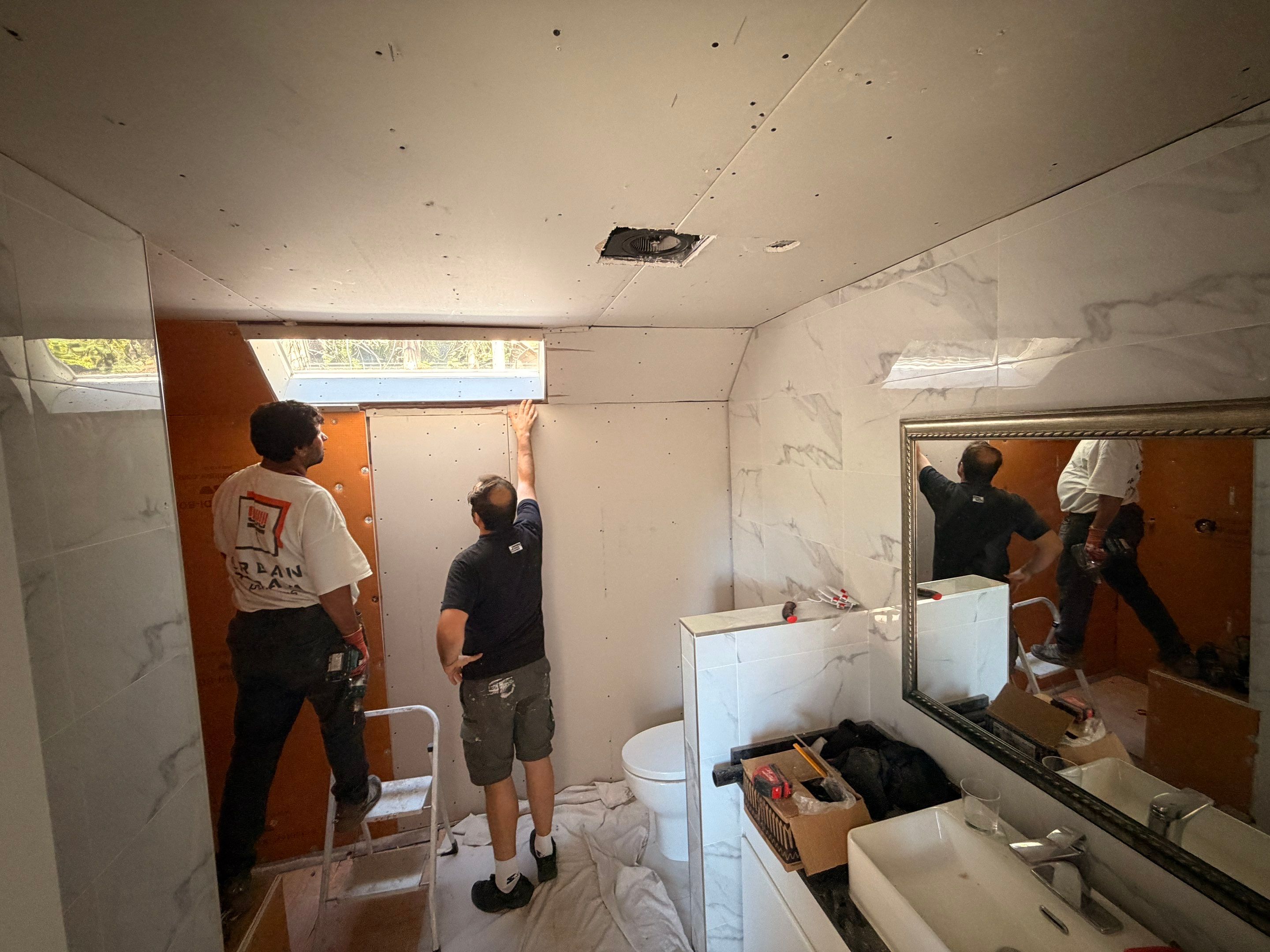 Water Damage Restoration & Bathroom Renovation in West Vancouver by YVR Construction Group