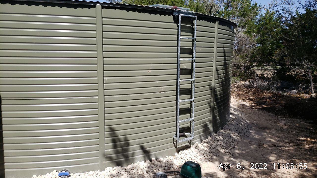 30K gallon mangrove green tank for residential rain water harvesting, Dripping Springs, TX by Hill Country Rain Water