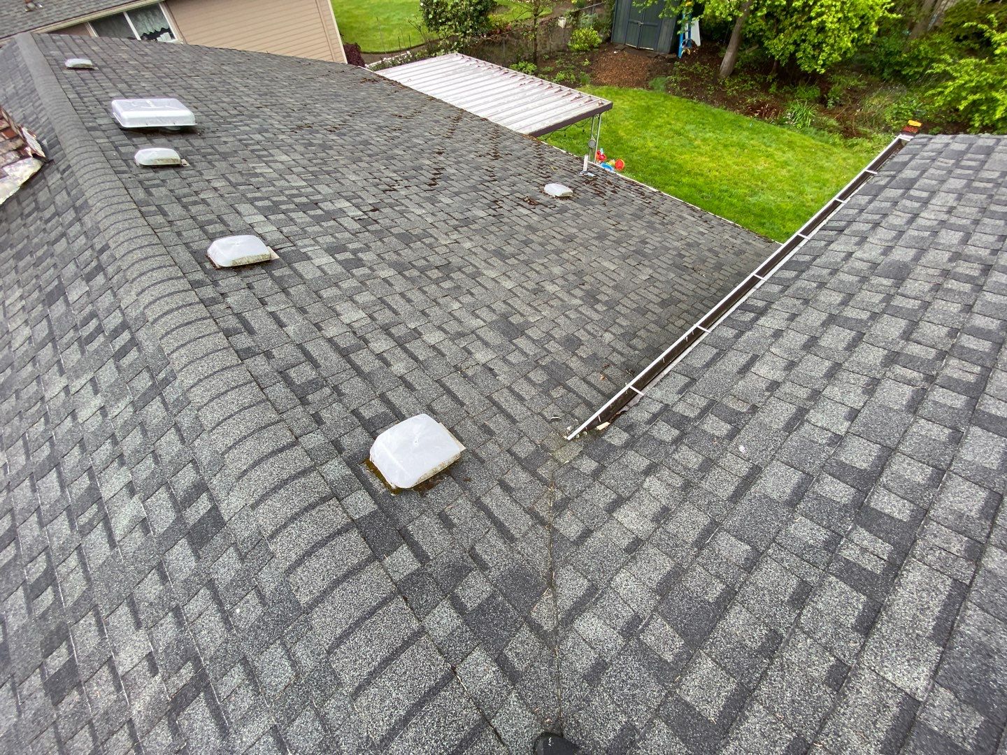 Onyx Black Shingles by Reimagine Roofing