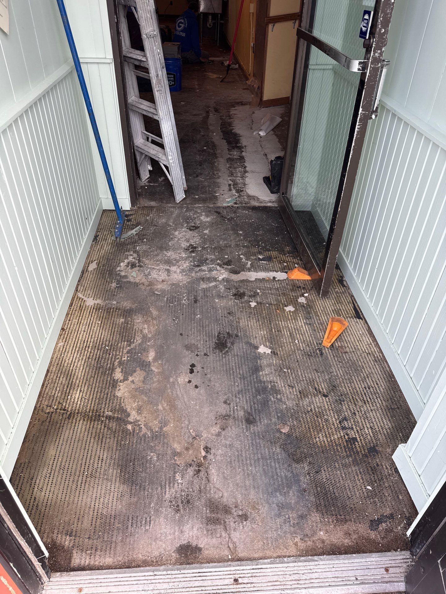 Epoxy Flooring Installation – Downtown Muskegon Commercial Space by Gordon Painting
